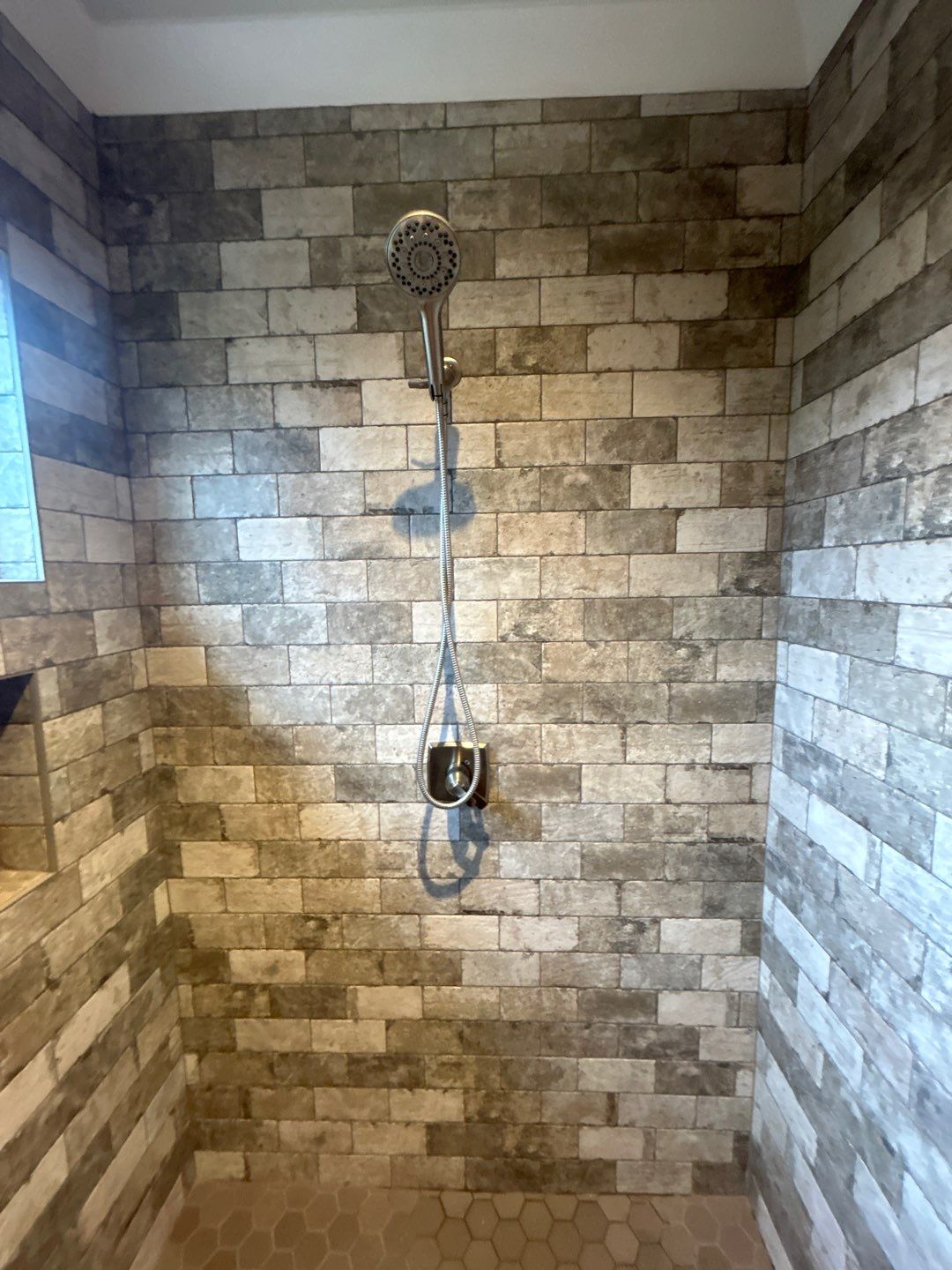 Shower upgrade by Footprints Floors of Nashville