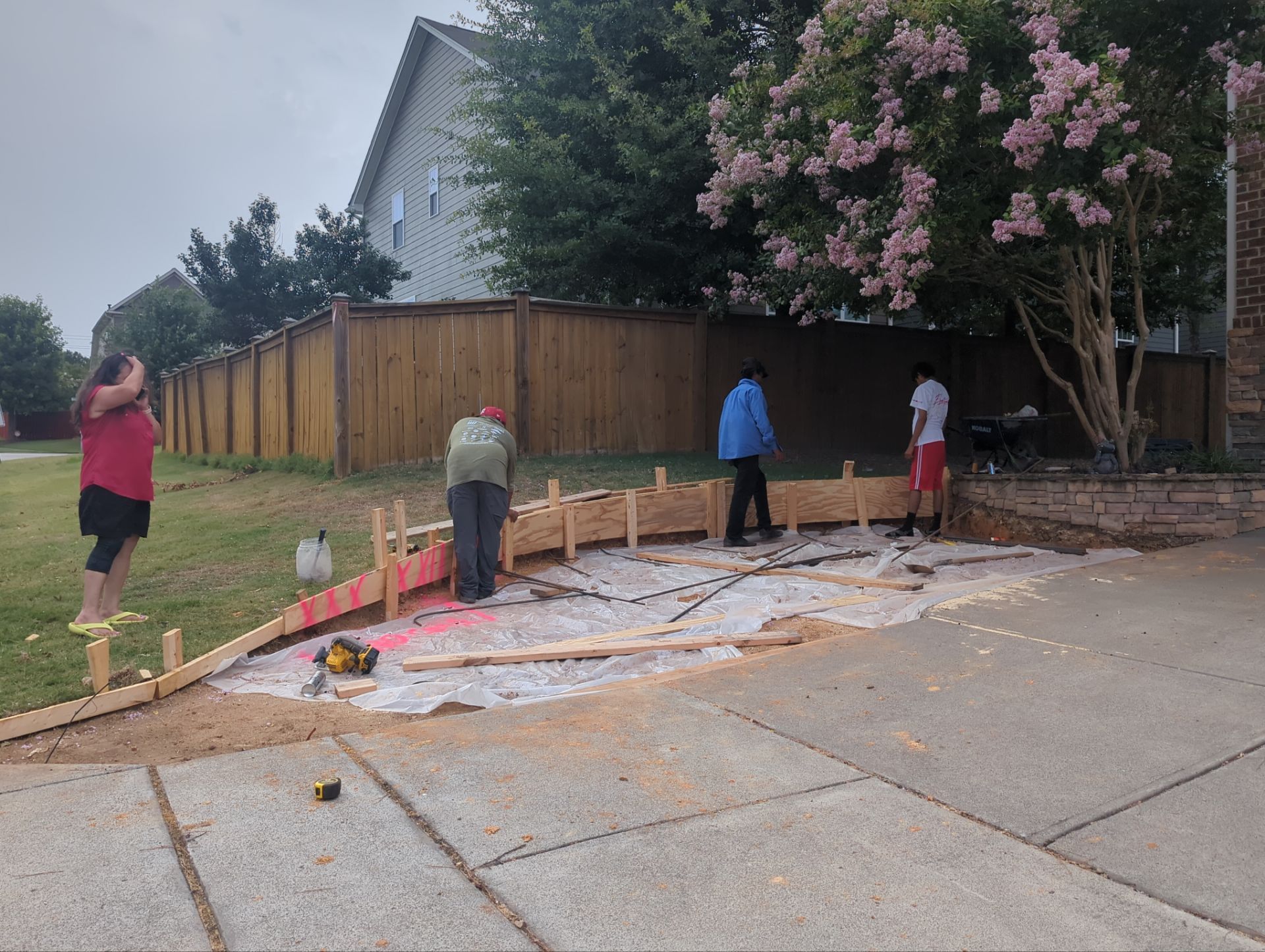 Concrete Driveway Expansion & Retaining Wall | Apex, NC by Elite Remodeling and Design LLC