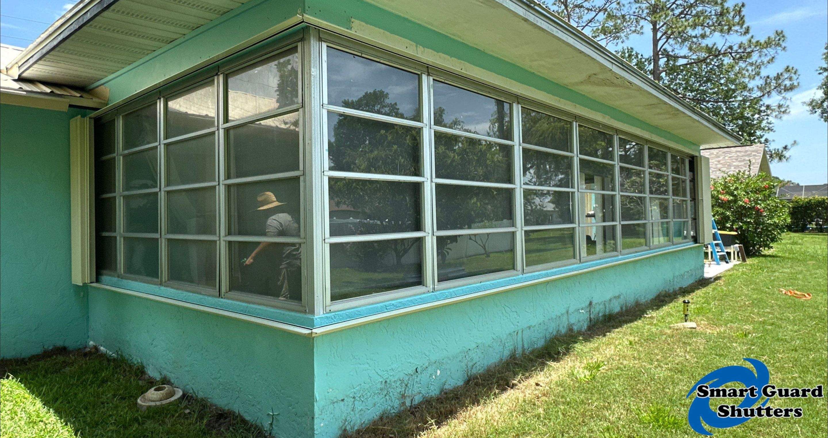 Accordion Shutter in Ivory by Smart Guard Shutters