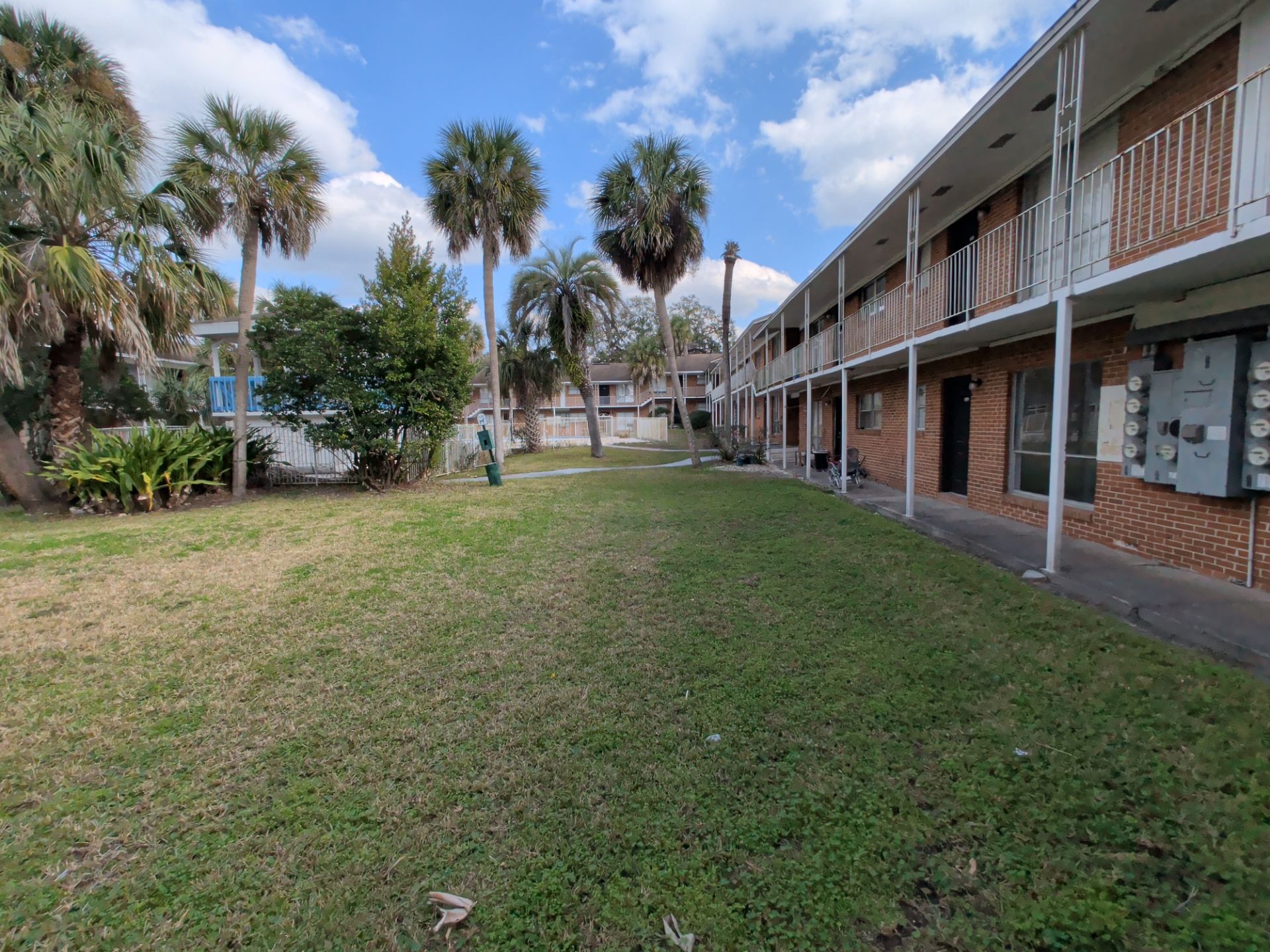 Apartment Landscape Cleanup & Ongoing Grounds Maintenance — Cimarron Apartments (Arlington) by Harmoni Home Services