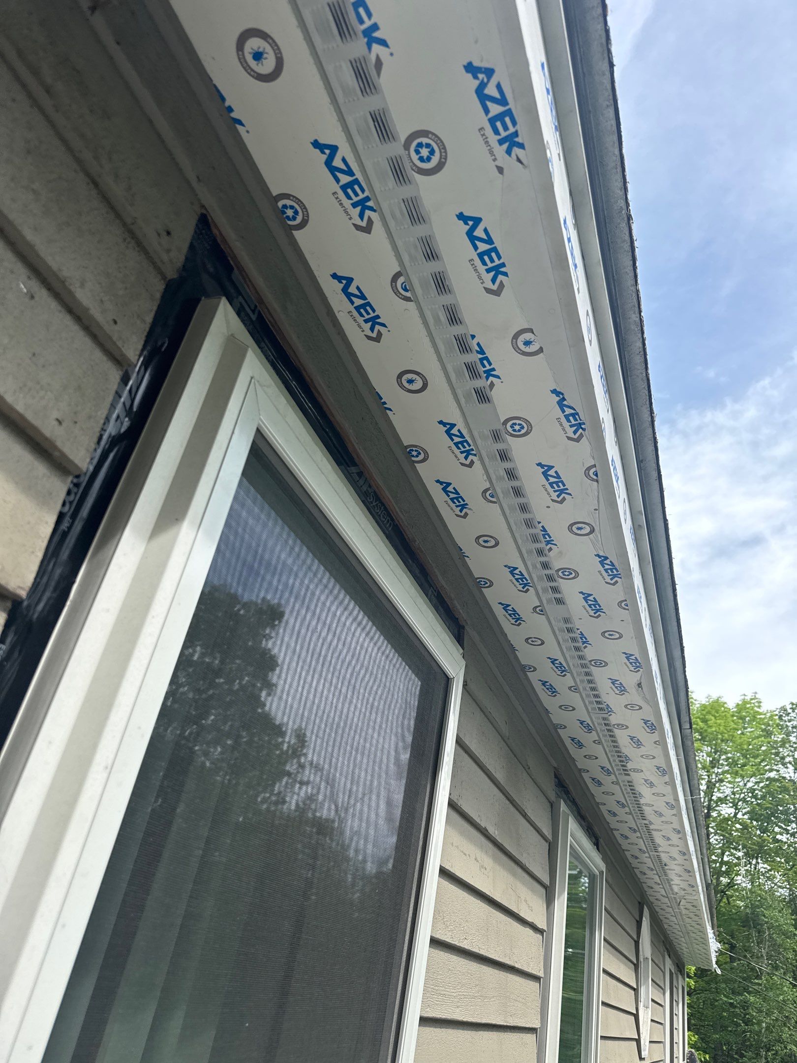 Vinyl Siding and AZEK PVC Trim Renovation in Weare by Compass exteriors
