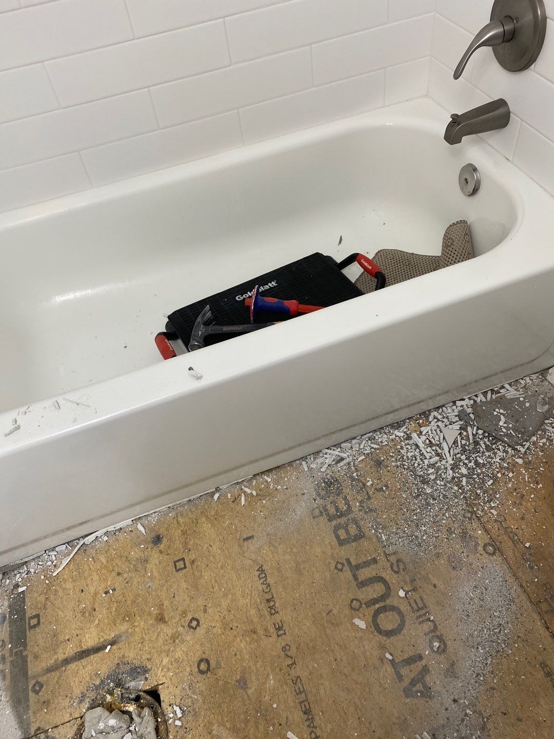 Bathroom Remodel using Two new bathroom design and new floors by Alpha Design Services