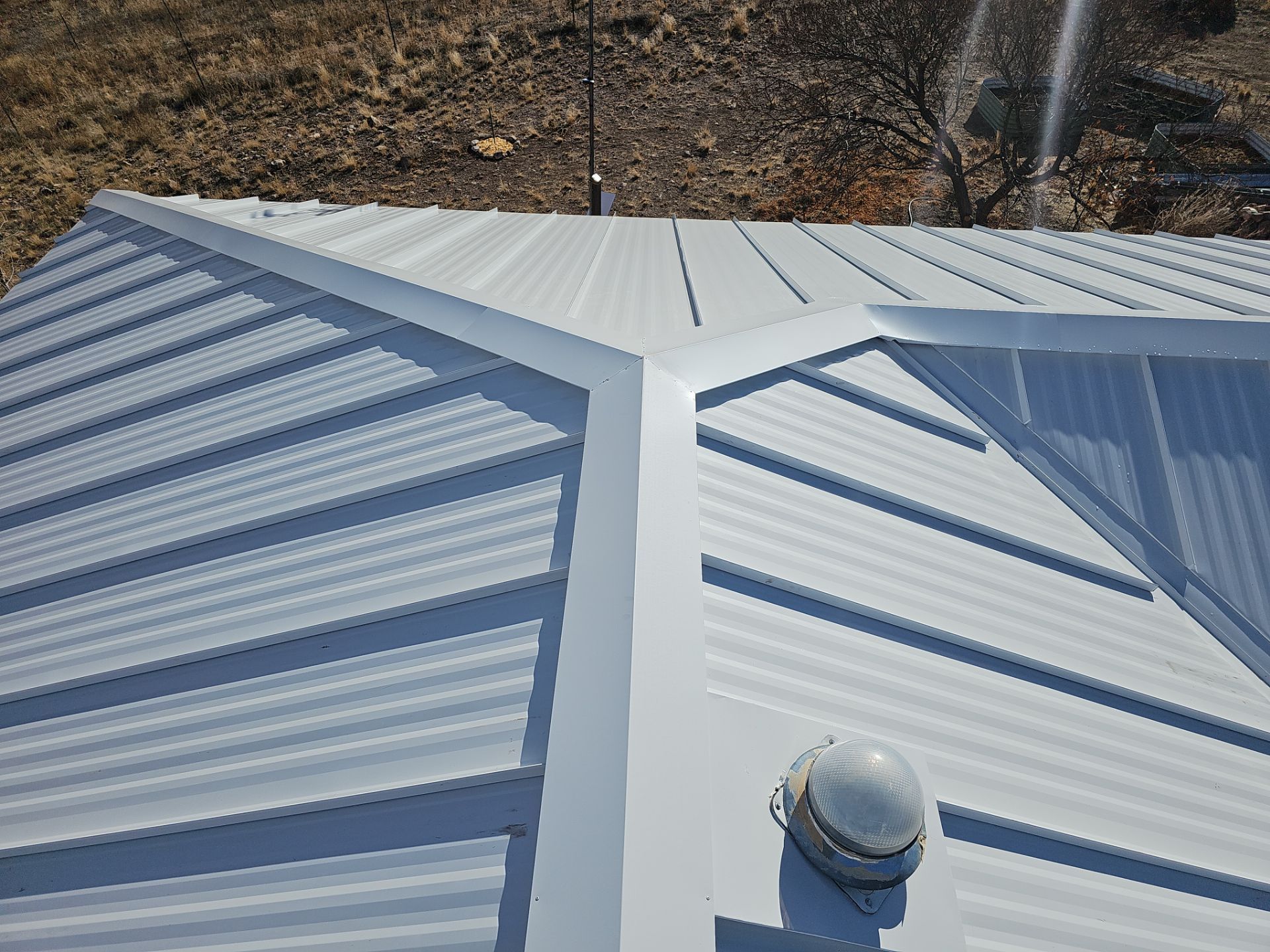 Arctic White Standing Seam by Reimagine Roofing