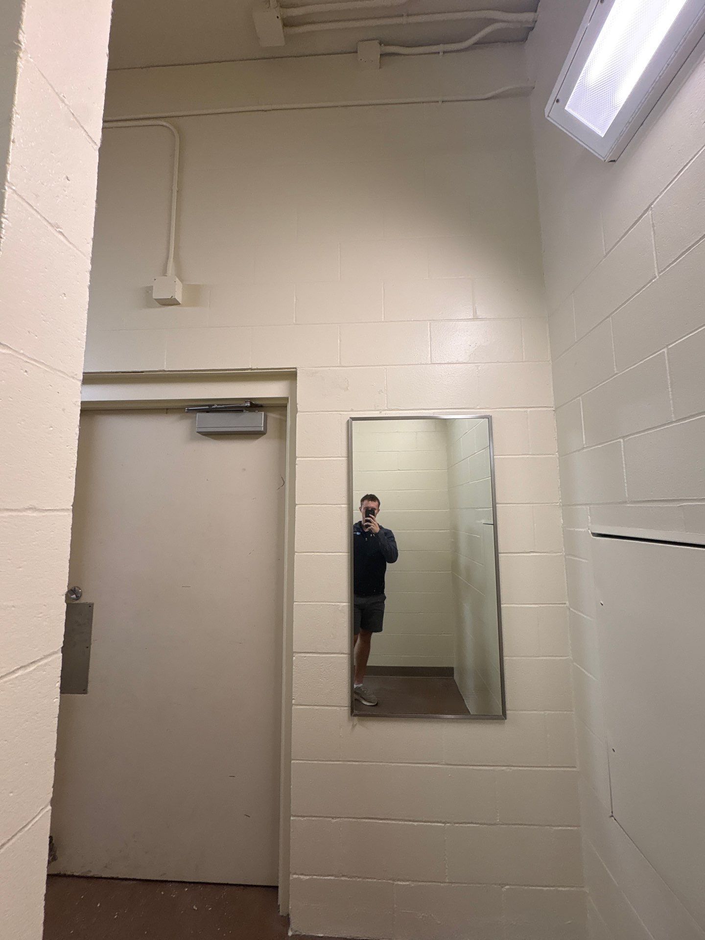 Commercial Restroom Interior Painting and Facility Updates in Sioux Falls by Select Painting, Coatings & Garage Cabinets