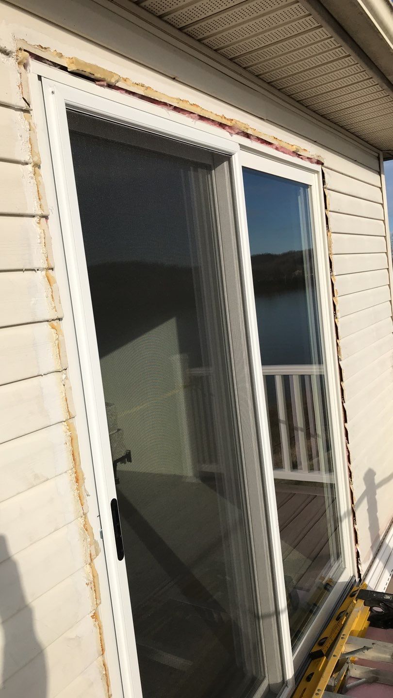 Deck Refurbush and Door Replacement using Trex Decking and Railing. Polaris Patio Doors by Secure Construction Company Inc
