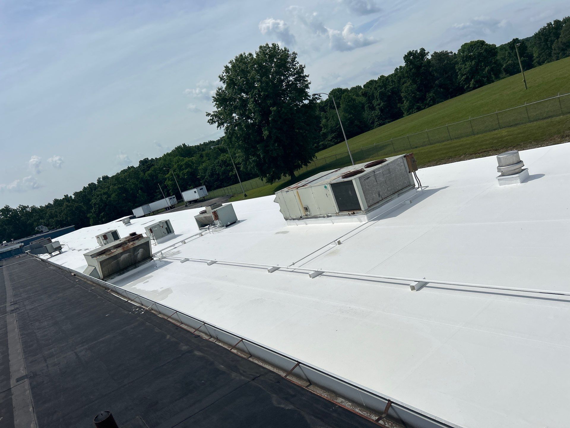 Commercial Roofing Installation using Coatings by Kentucky Commercial Roofing