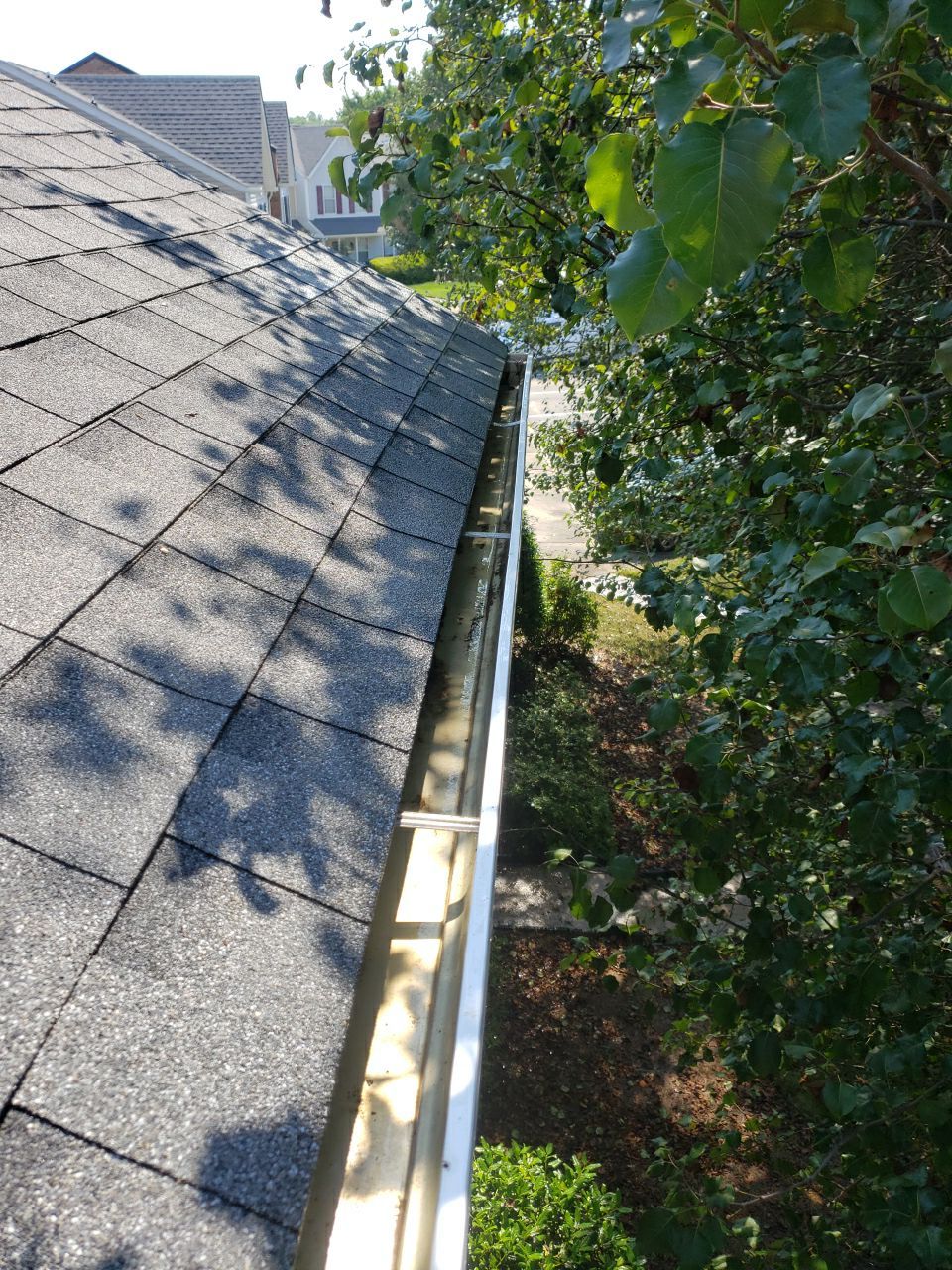 Gutter Cleaning using water by Power Wash Masters LLC