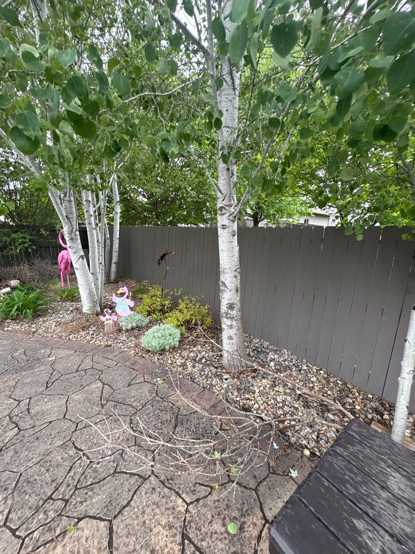 Sioux Falls Residential Exterior Update and Flagstone Pool Deck by Select Painting, Coatings & Garage Cabinets