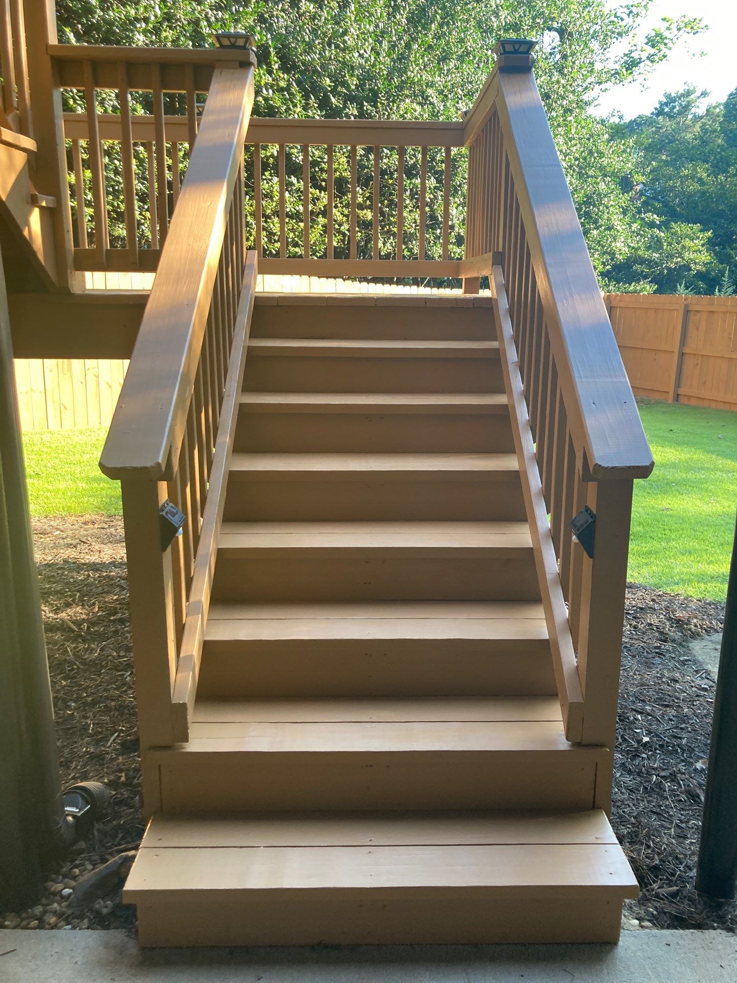 Deck and Fence Stain with Deck Board Repairs in Atlanta, GA by Nelson Exteriors 