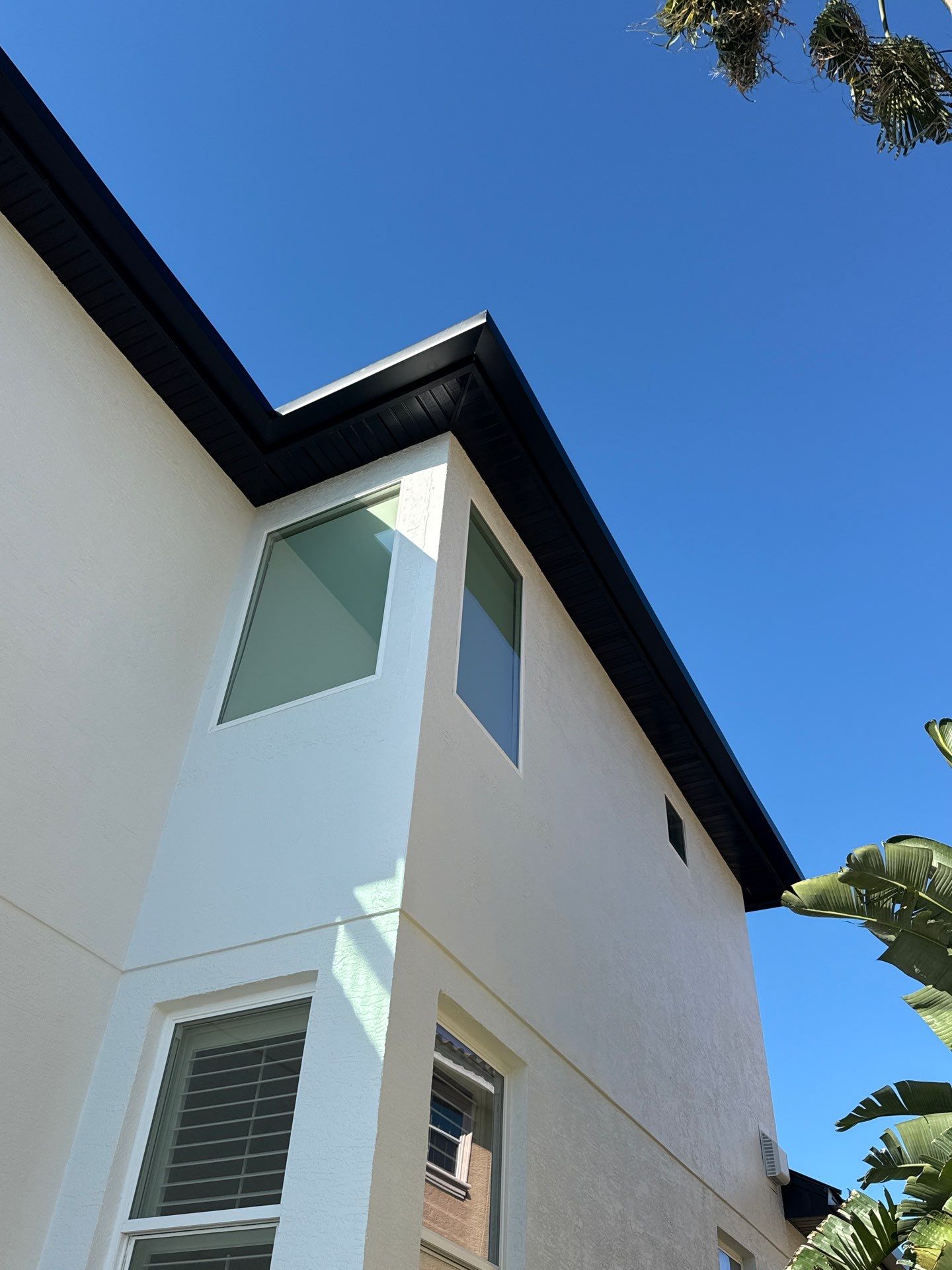Soffit and Fascia Installation and black seamless gutters in Sarasota FL by Gutter Professors