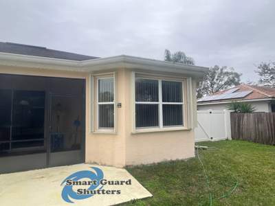 Accordion Shutters in Ivory