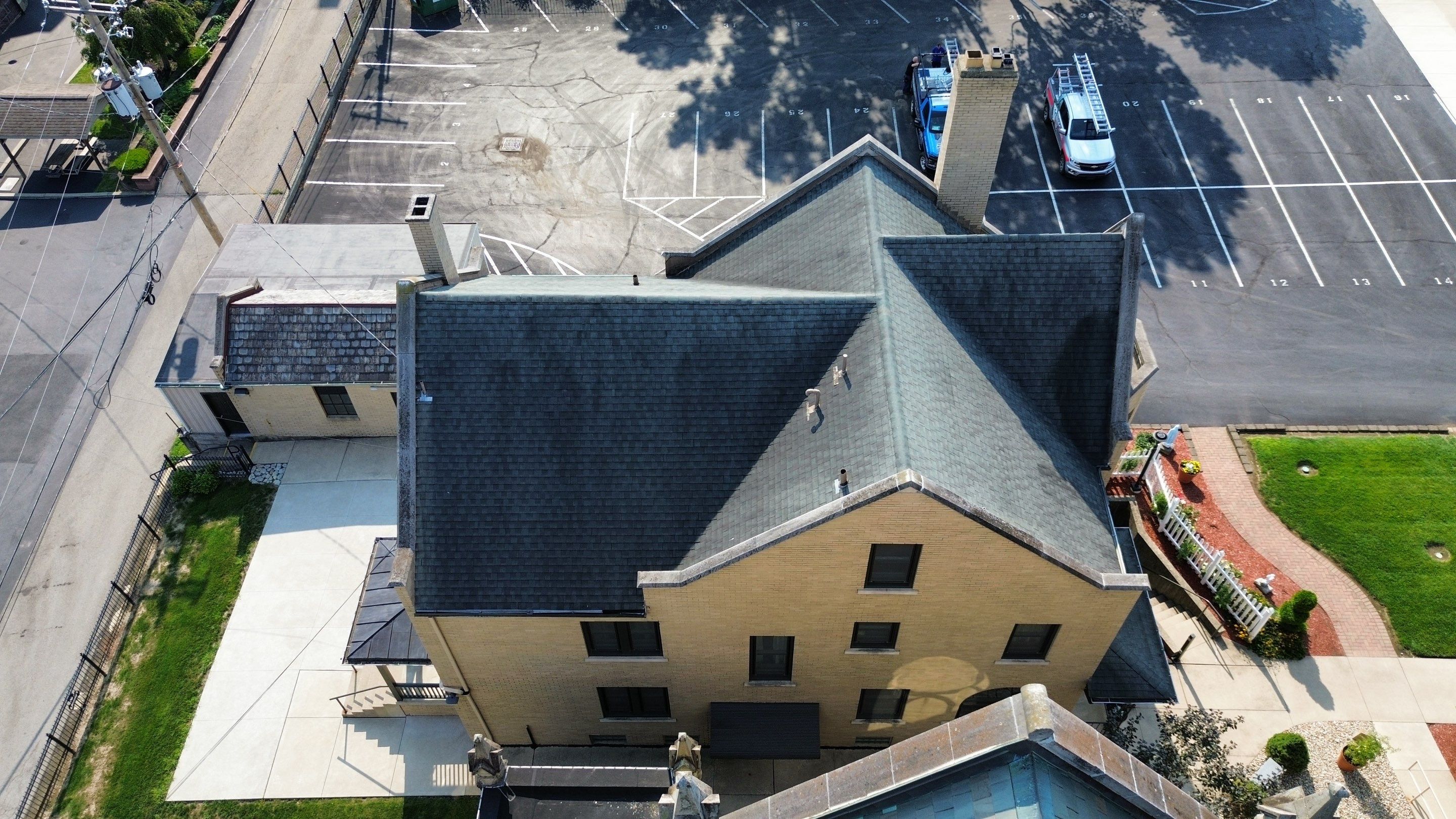 Commercial Roofing Installation using Standing Seam Metal - Frost Black by RoofX 