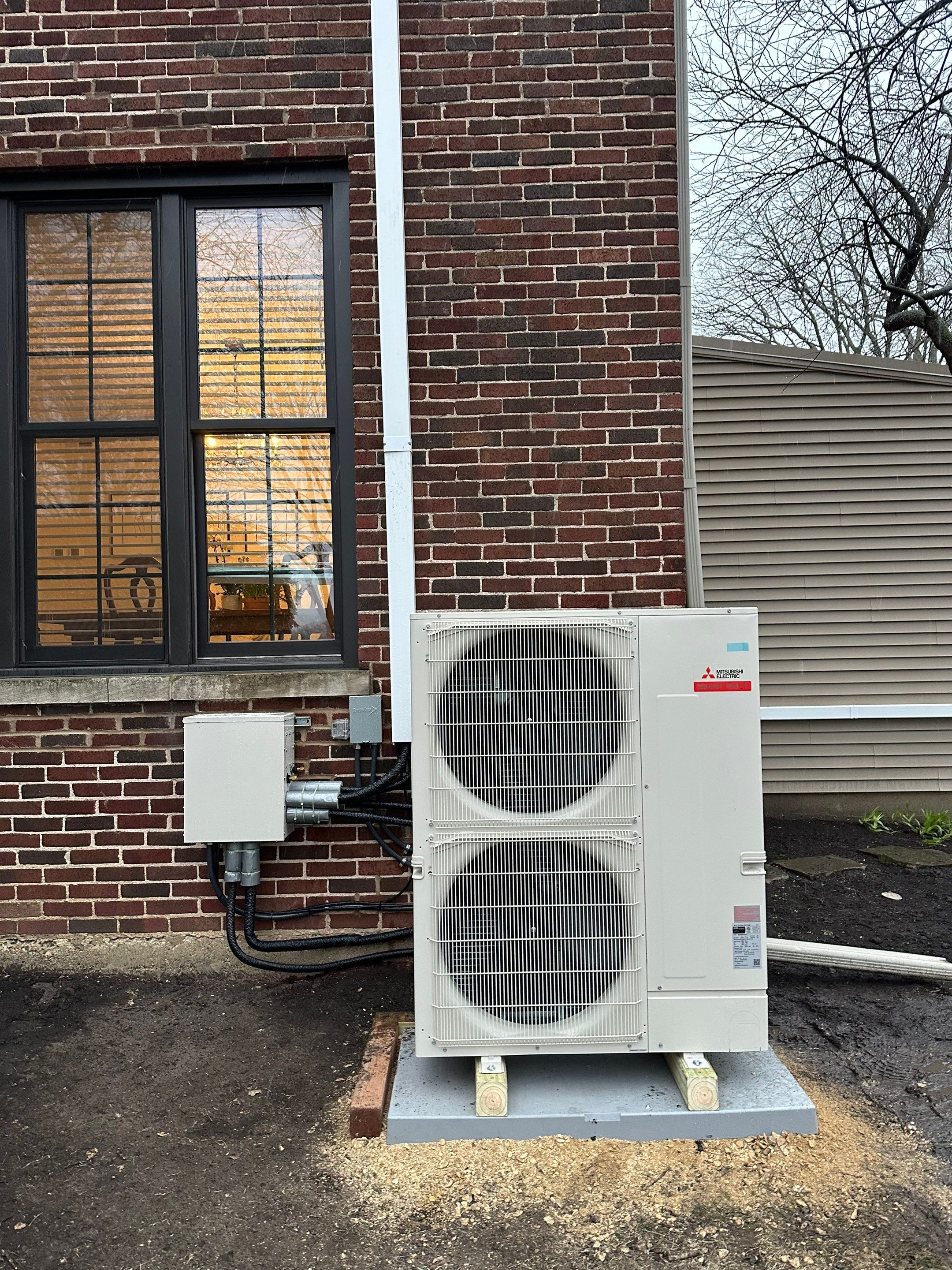 Central Air Conditioning Installation using Mitsubishi 4 Ton Smart Multi Zone Heat Pump System by Ragano Heating & Air Conditioning Inc