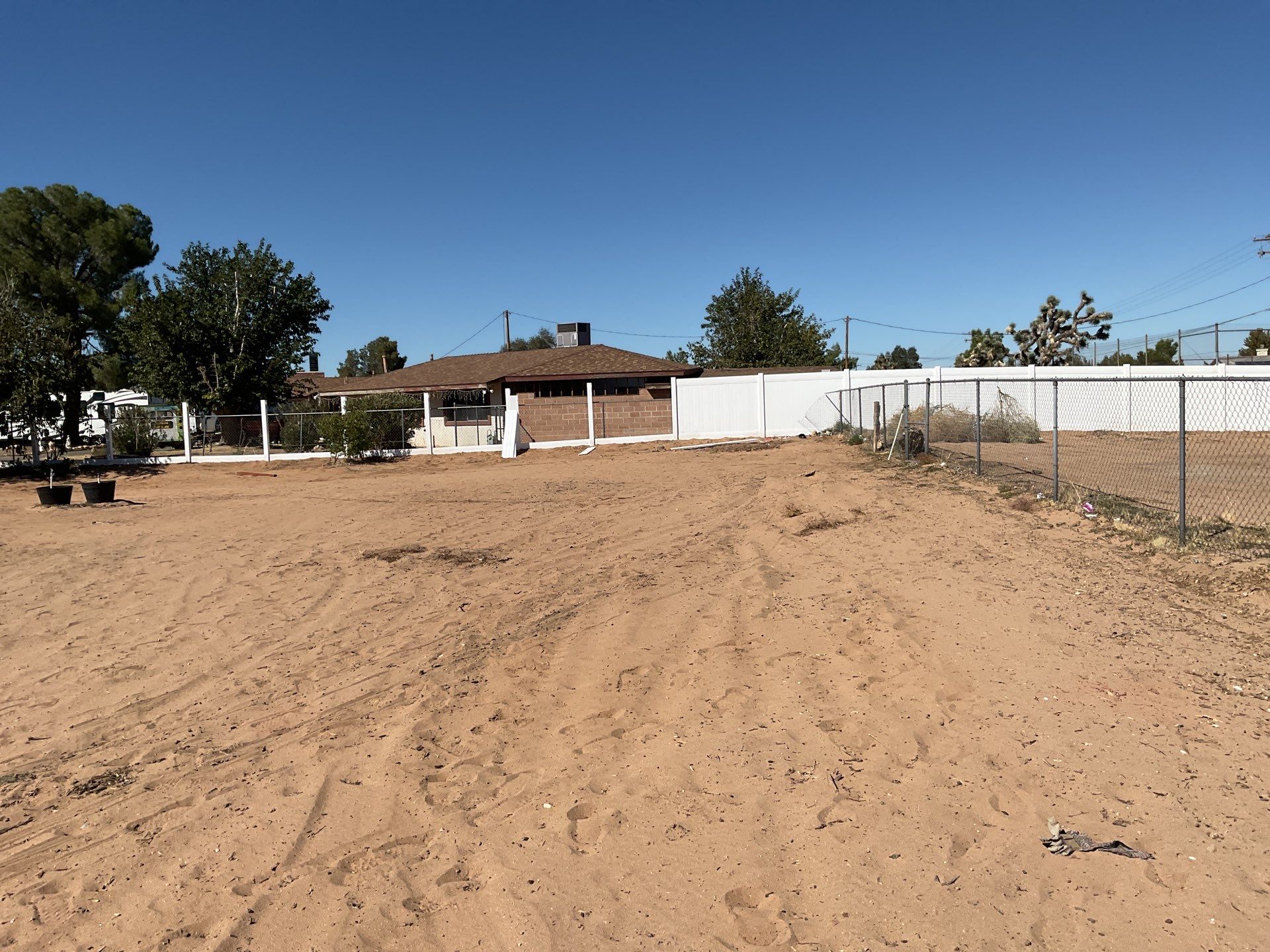 White picket fence  by Fence Guys Inc. 