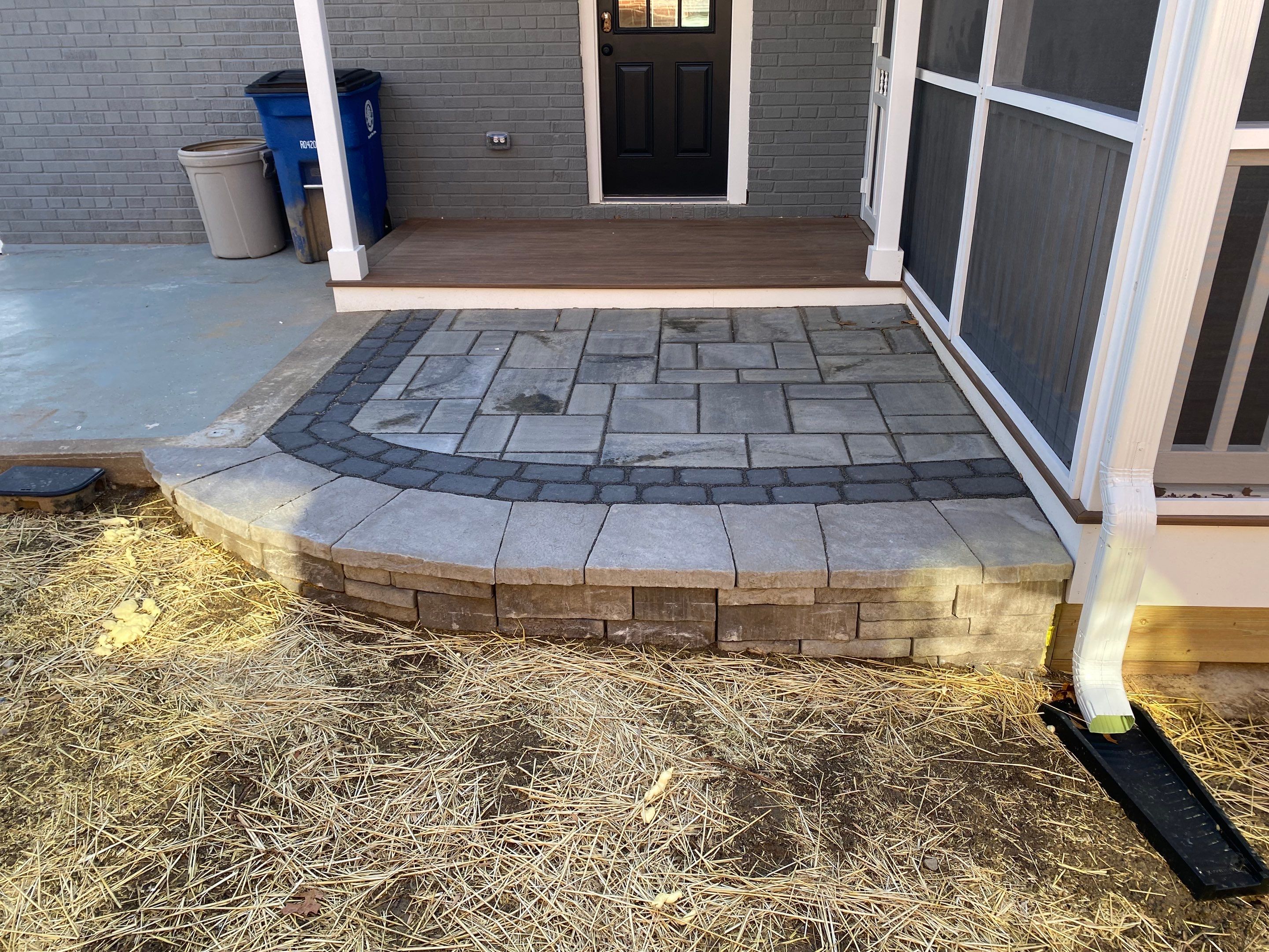 Retaining wall, walkway, small patio and landscape install by The Smet Companies, LLC