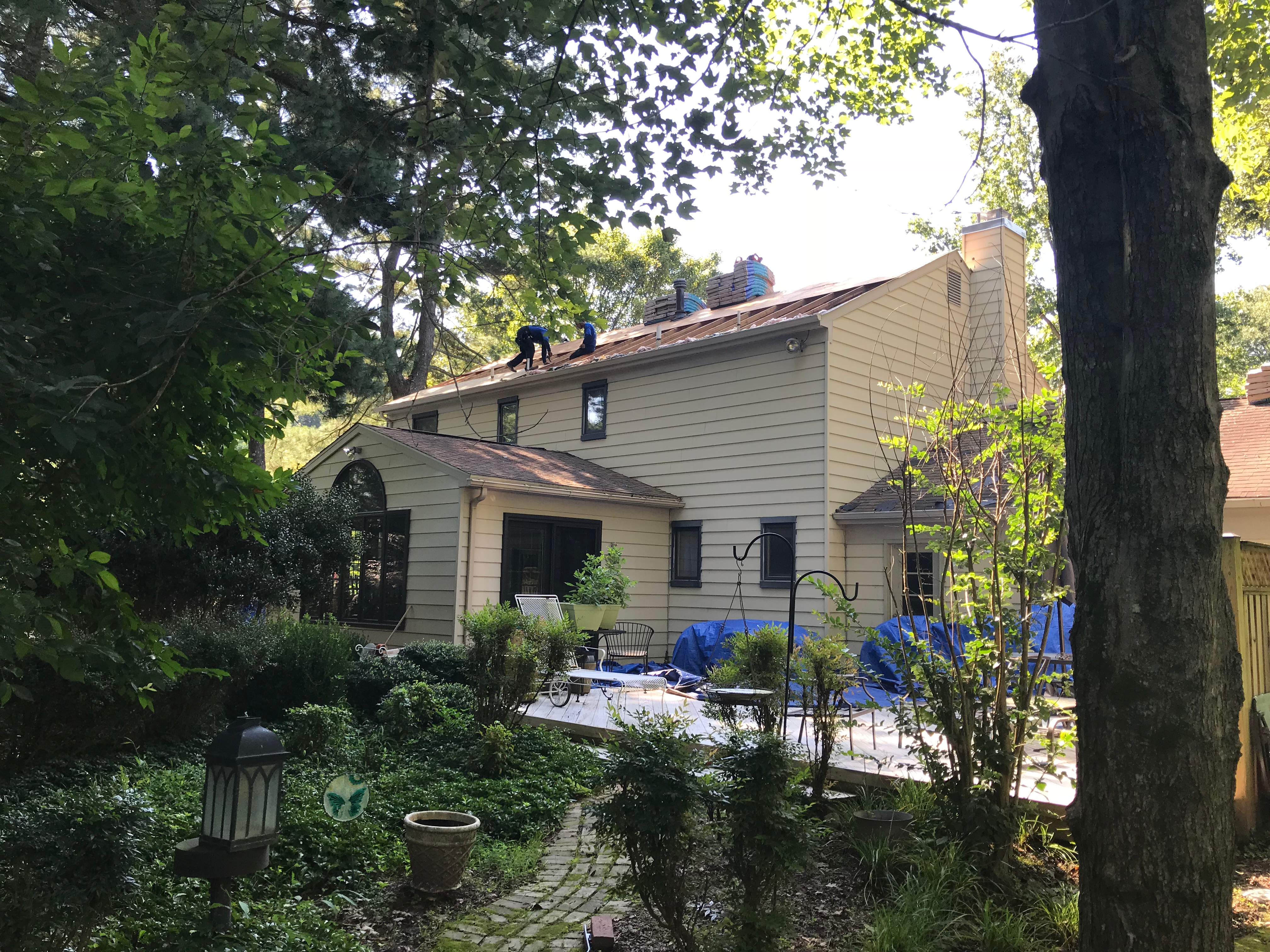 Residential Roofing Installation using Landmark Shingles Color Weatherwood by Alpha Design Services