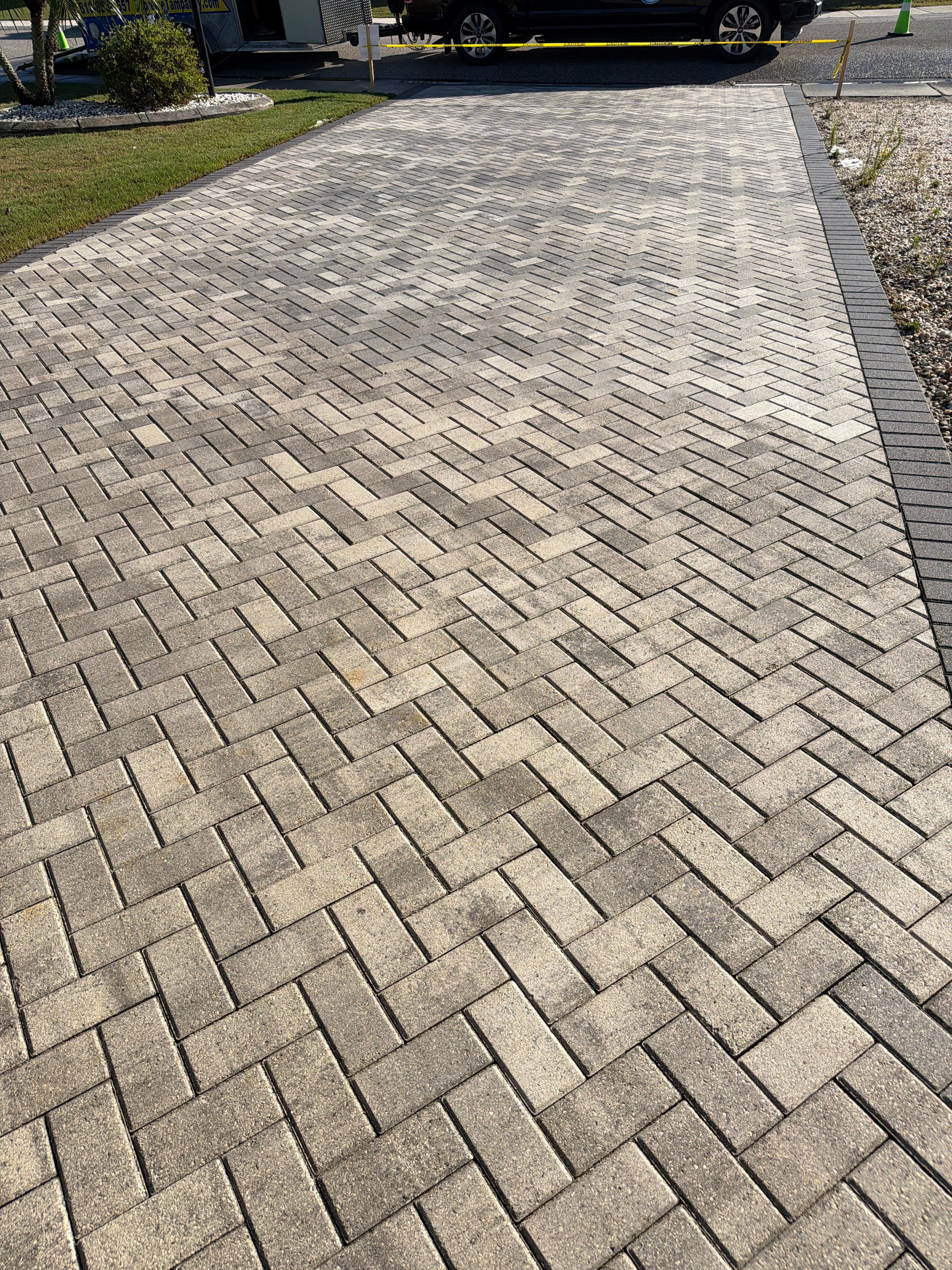 Paver Sealing and Cleaning for Herringbone Driveway in Sun City Center by Supreme Paver Experts