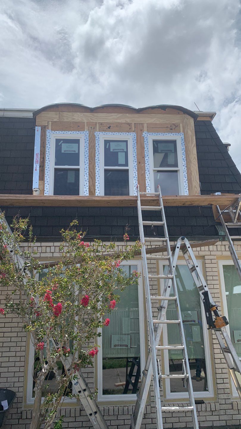 Mansard Charm by Bayfront Roofing and Construction