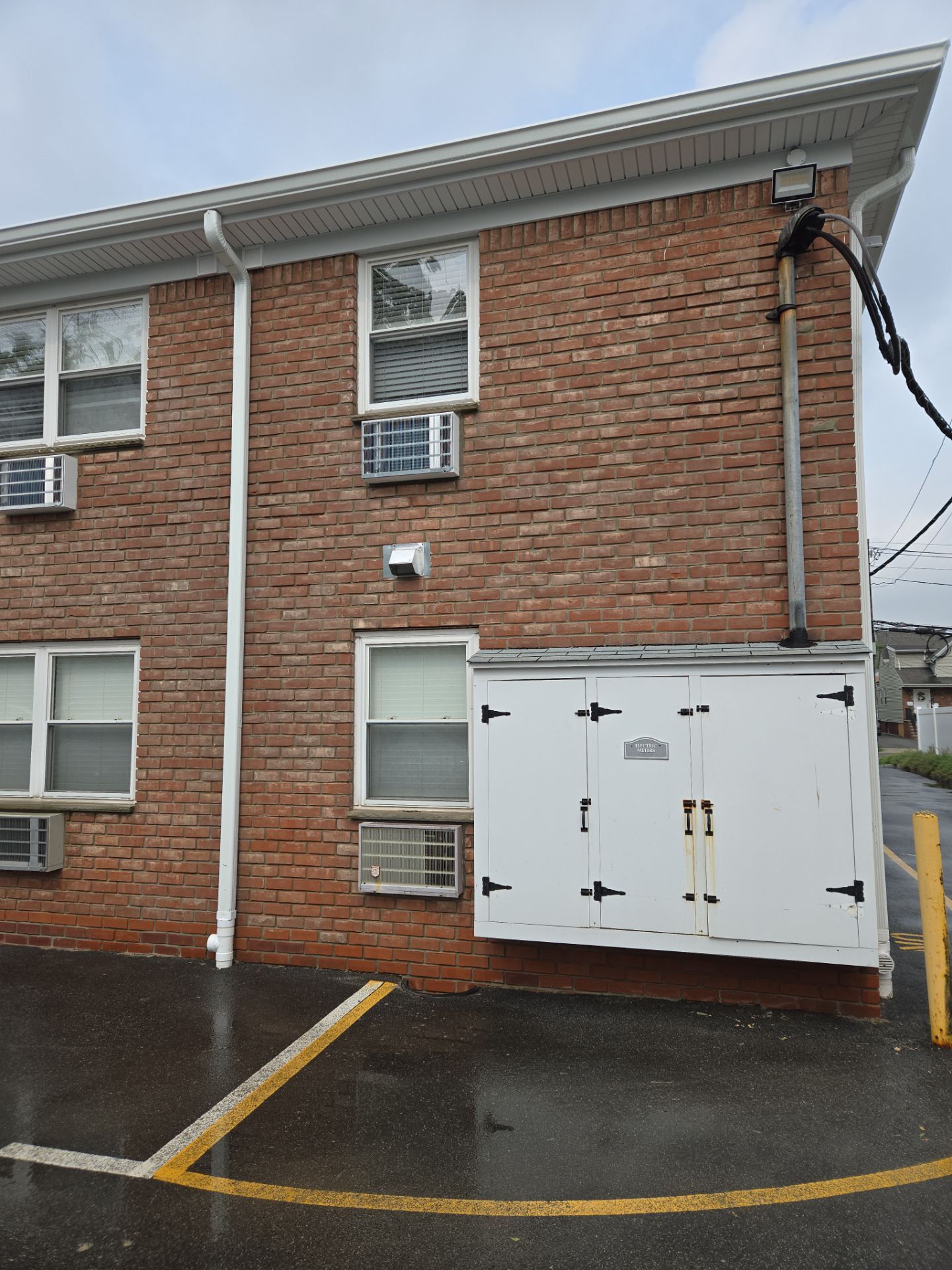 Multi-Unit Apartment Complex Exterior Brick Painting Project in Hackensack by Spectrum Painting, LLC