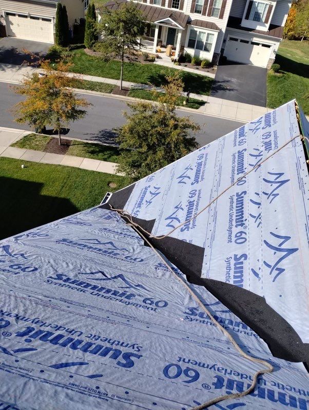 Residential Roofing Installation using Atlas Pinnacle Pristine Black Architectural Shingles by Frederick Roof Repair