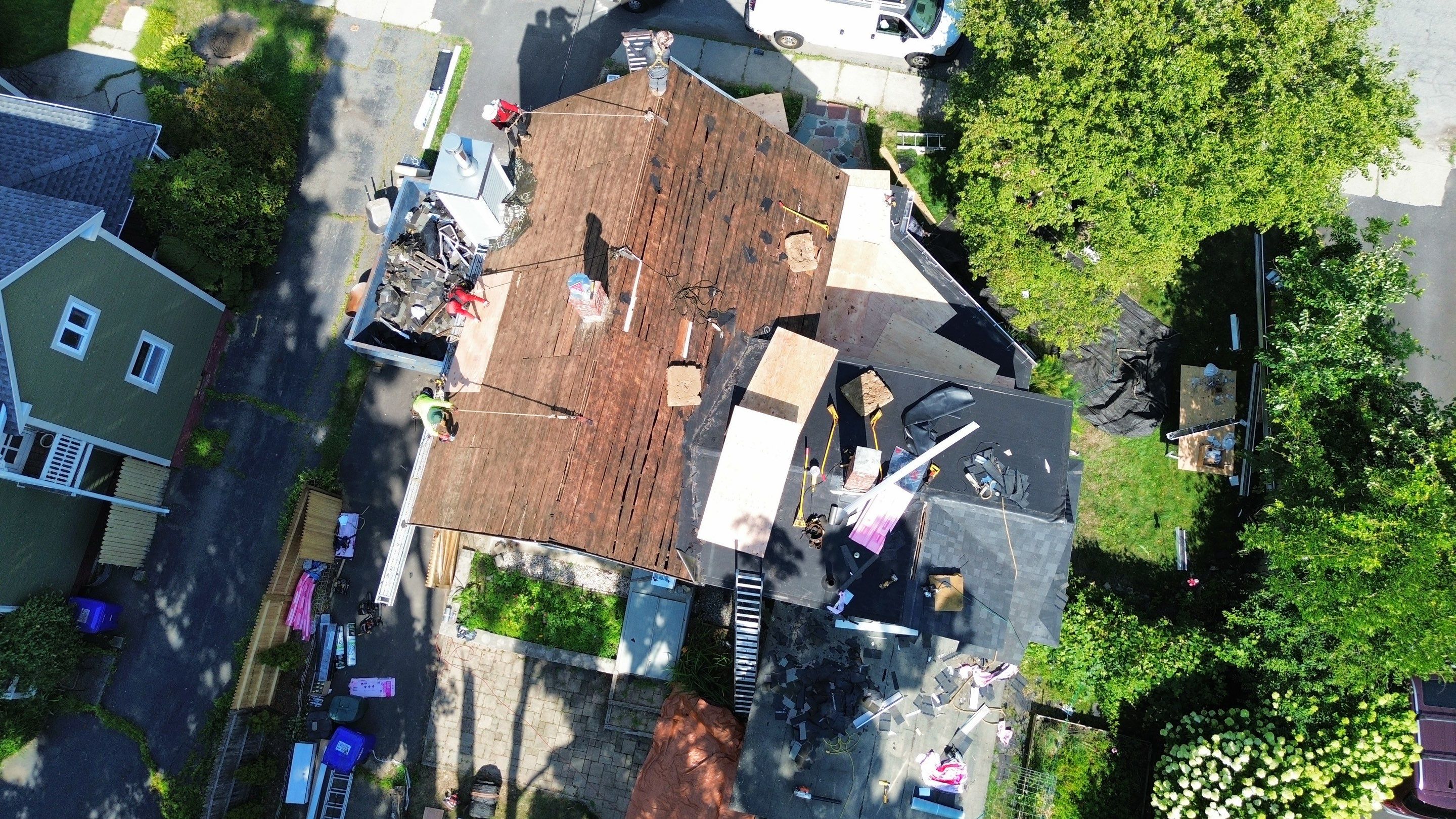 Full Roof Replacement + Custom Gutter Install | Onyx Black Finish by Mighty Dog Roofing of Greater Middlesex County