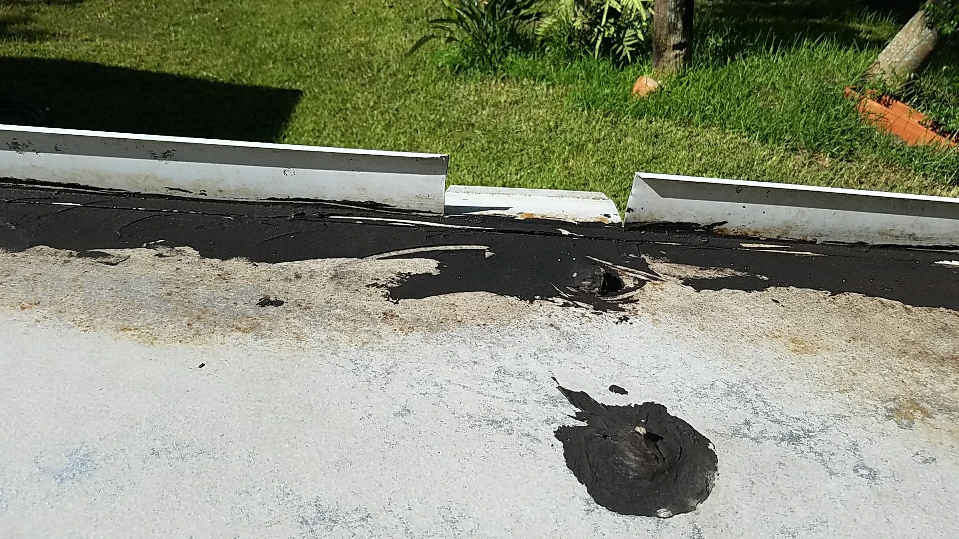 Flat Roof Repair using Certainteed Flintlastic SA Roofing System by Aastro Roofing