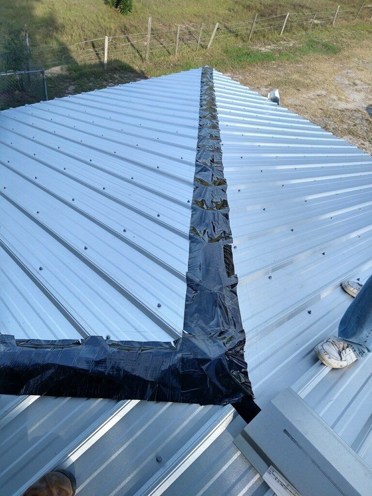 Residential Roofing Installation using 26 GA Rib Panel Galvalume by 1st Class Roofing, Inc.