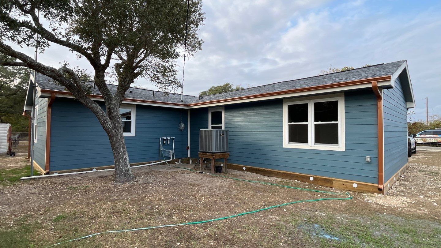 Customized Cabin by Bayfront Roofing and Construction