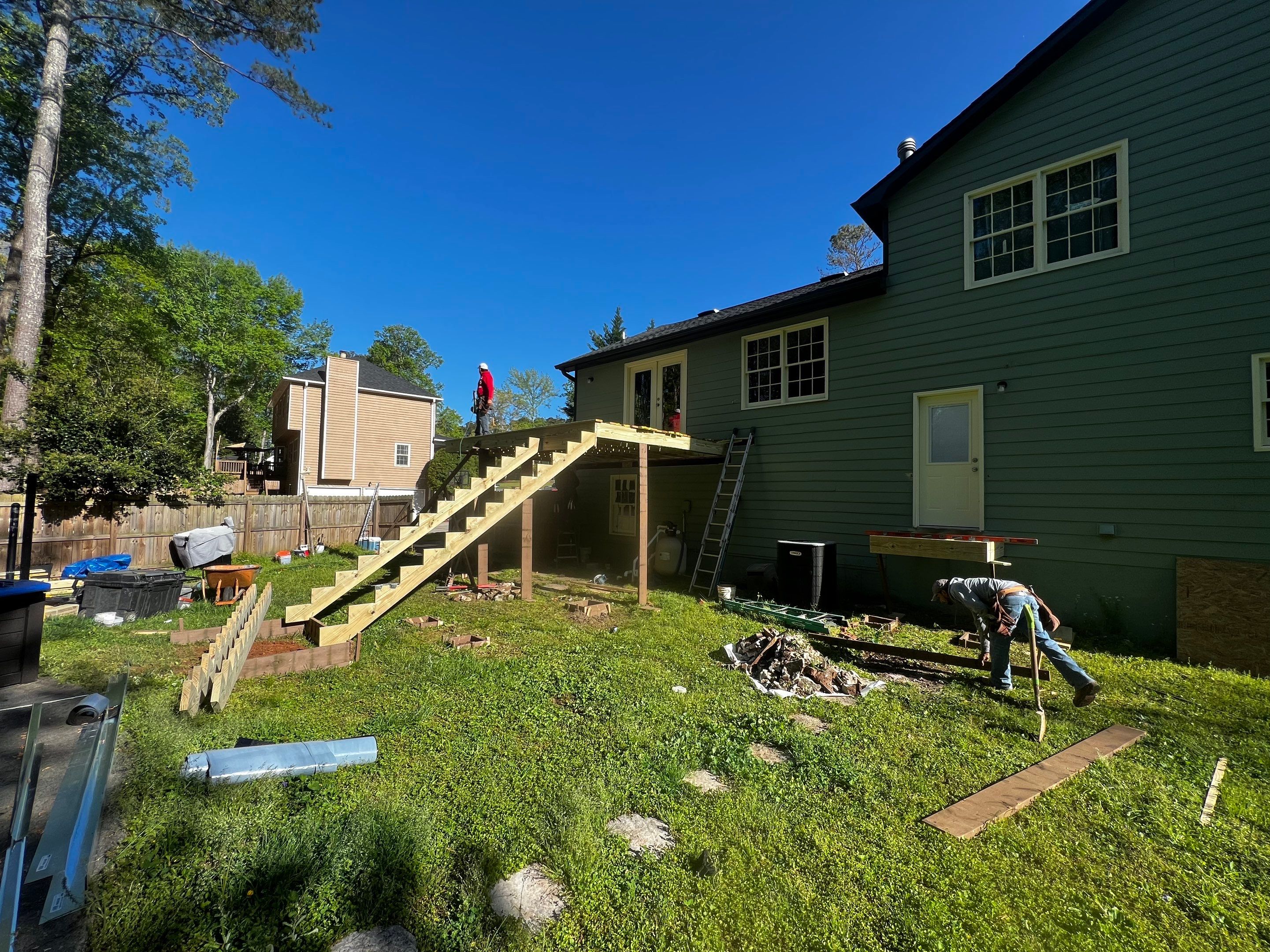 Elevated Pressure-Treated Wood Deck Replacement in Marietta by Swift Home Renovations