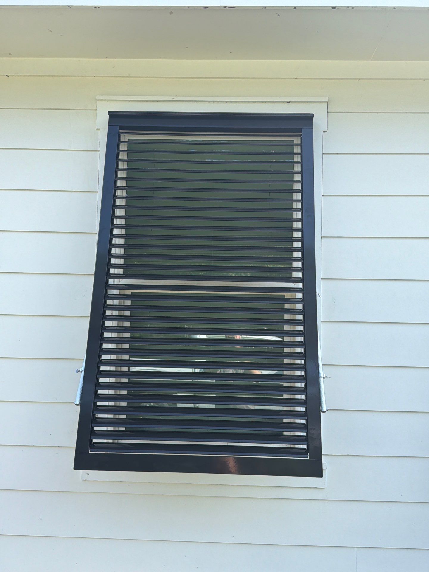 Custom Aluminum Bahama Shutters and Storm Protection in Santa Rosa Beach by Brannan Aluminum Inc.