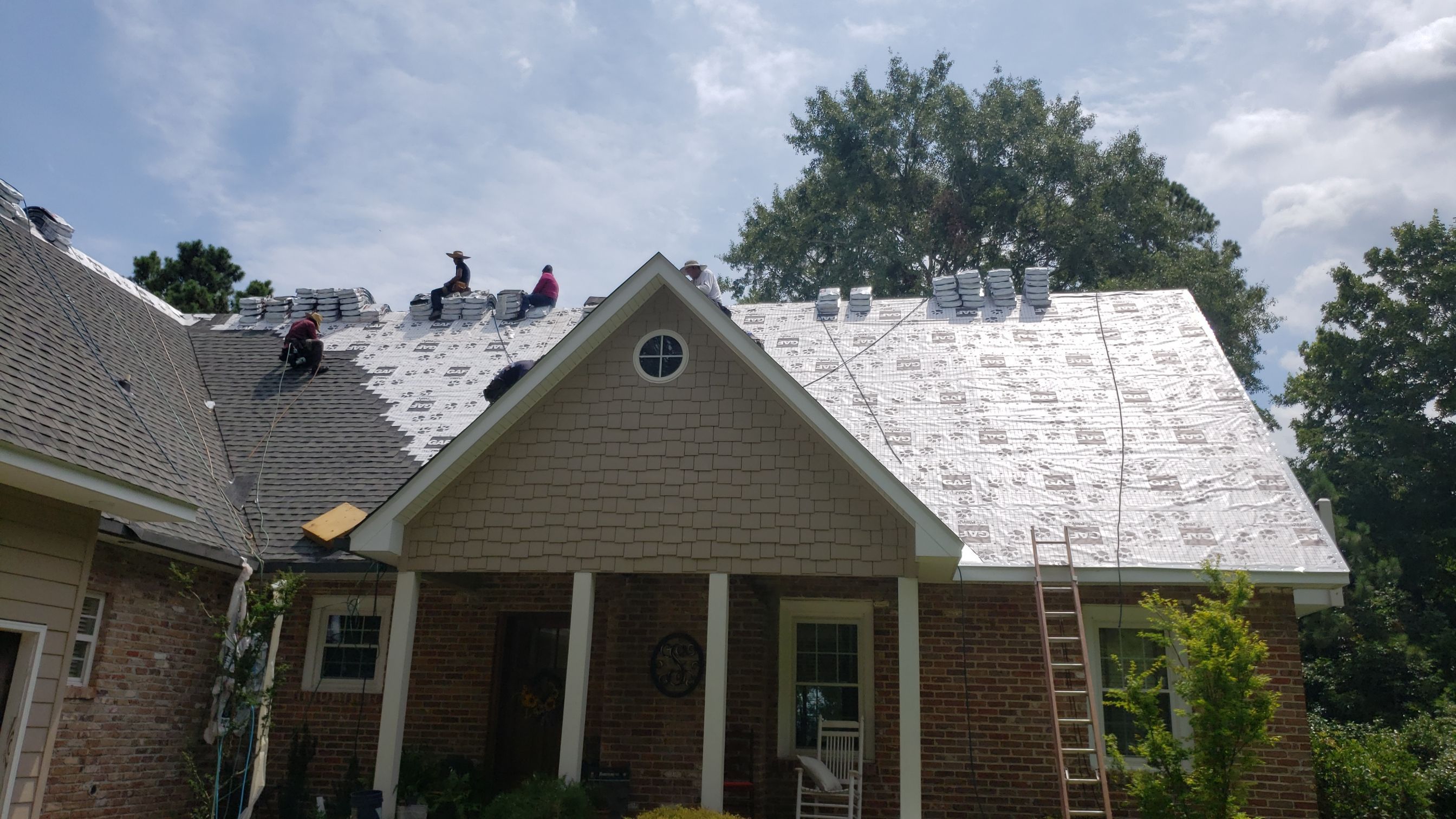 Residential Roofing Installation using Roof Replacement by American Roofing & Construction LLC