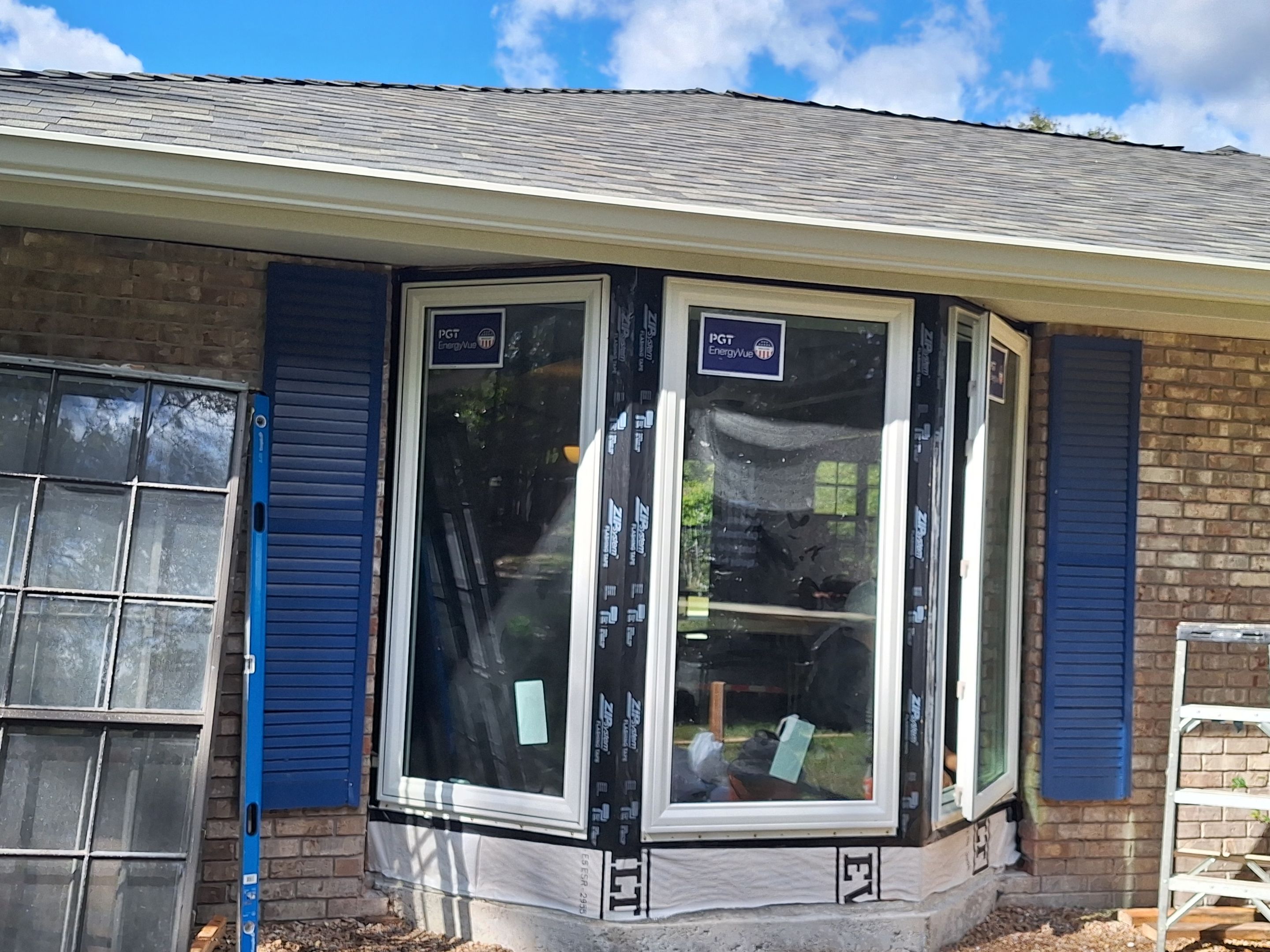 Fortified Roof and Porch Addition by Husband Roofing & Contracting