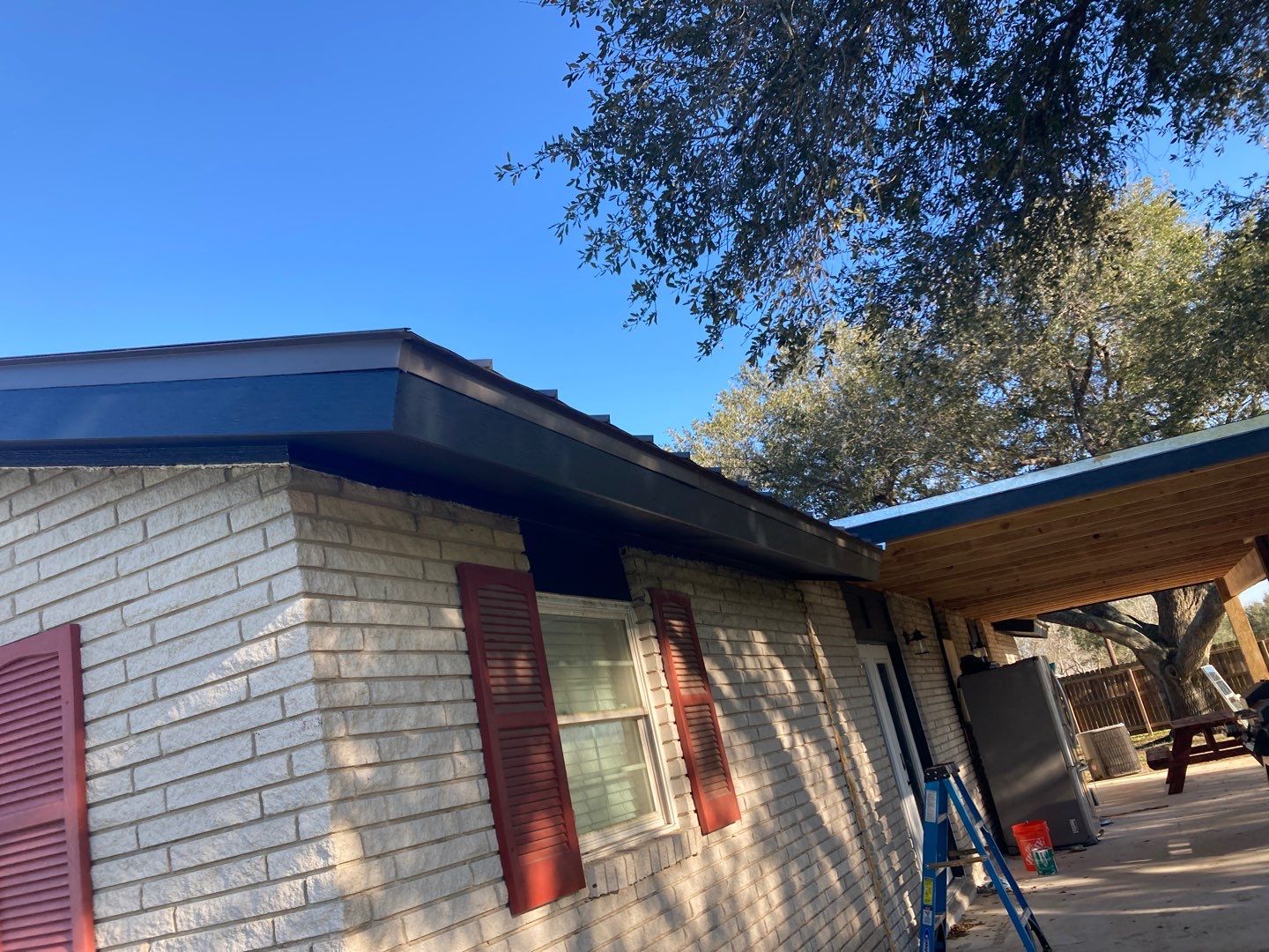 Beeville Backporch sittin' by Bayfront Roofing and Construction