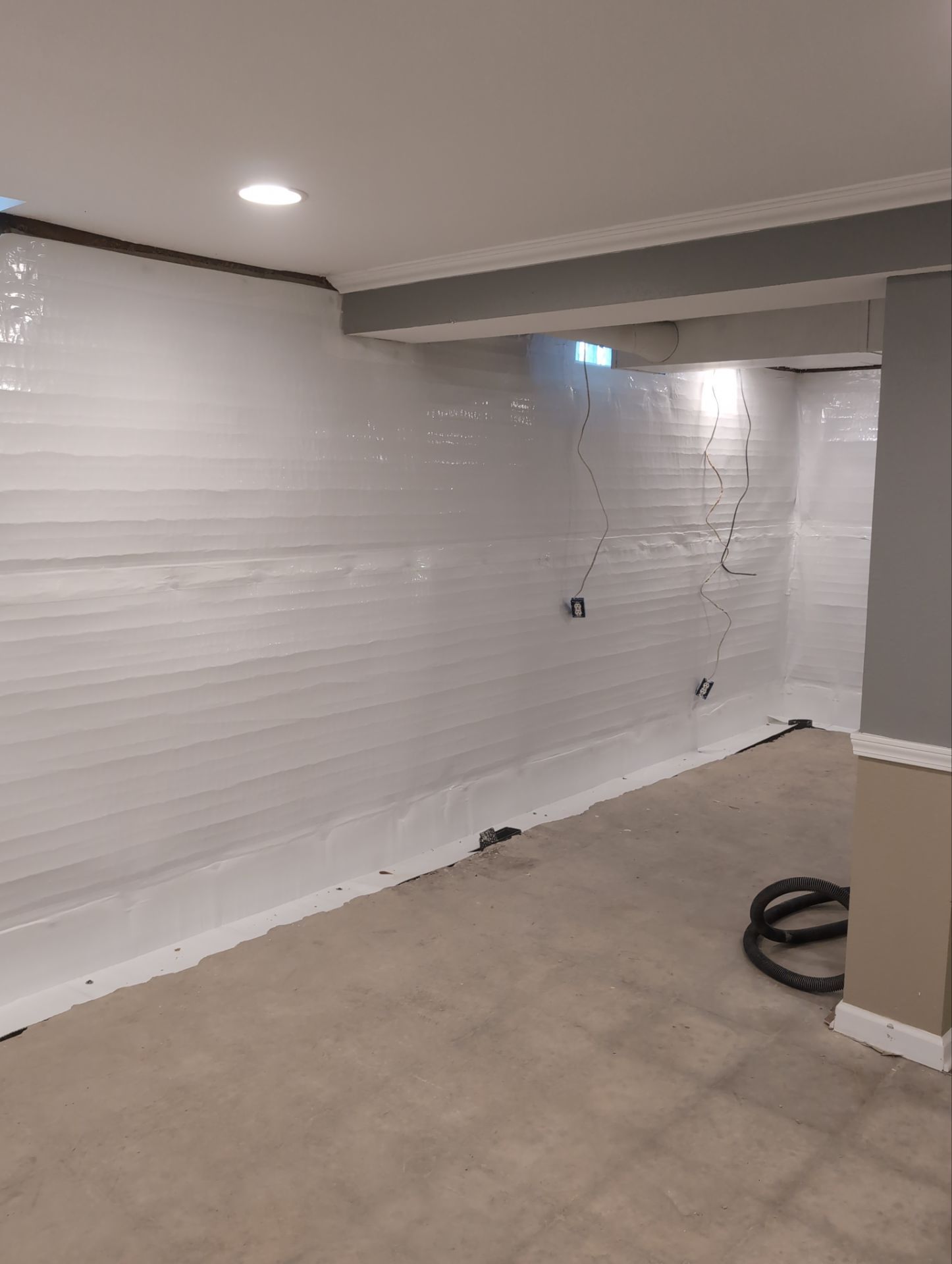 Interior Basement Waterproofing System and Egress Window Installation by Toledo Basement Repair 