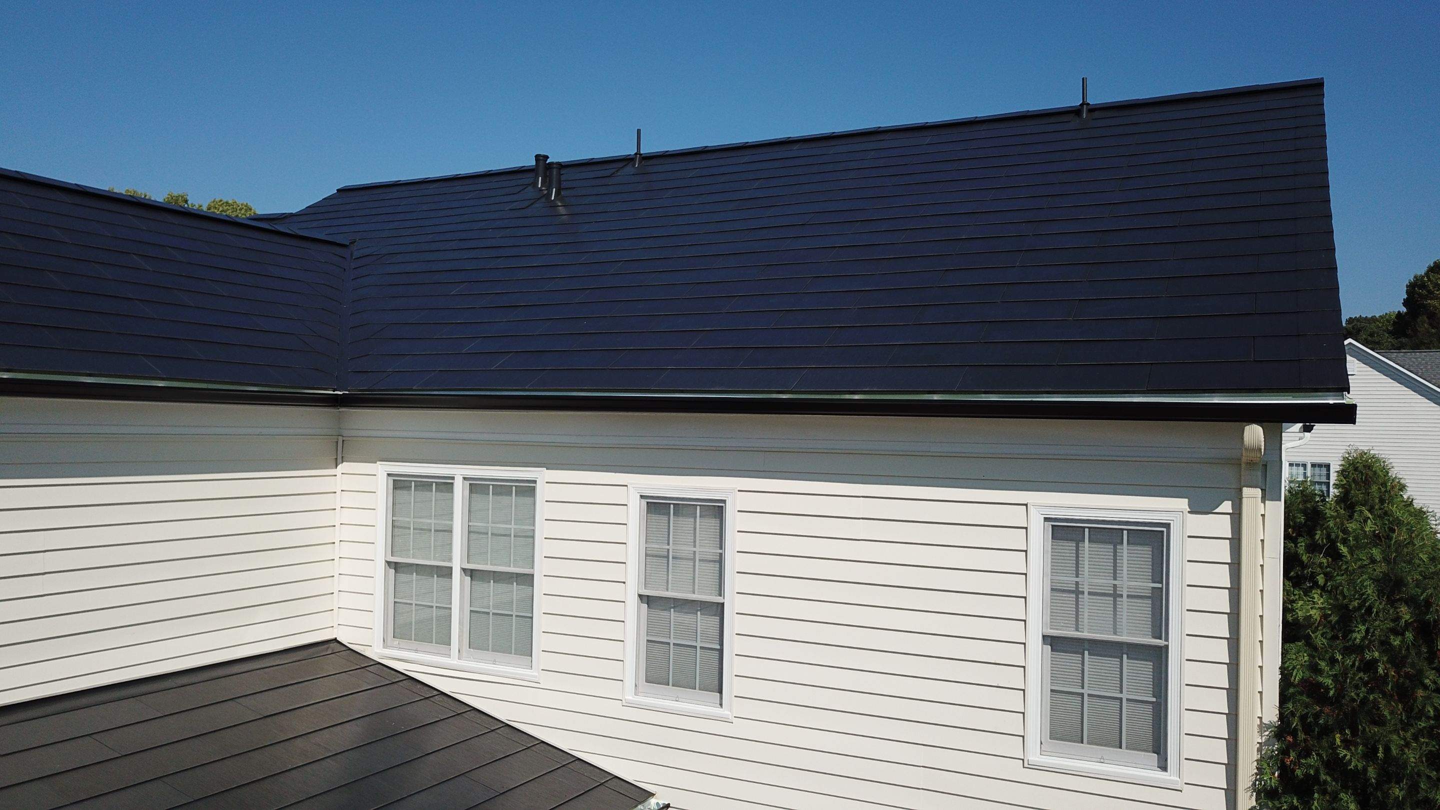 Tesla Solar Roof Replacement using Tesla Solar Roof V3 tiles by American Home Contractors