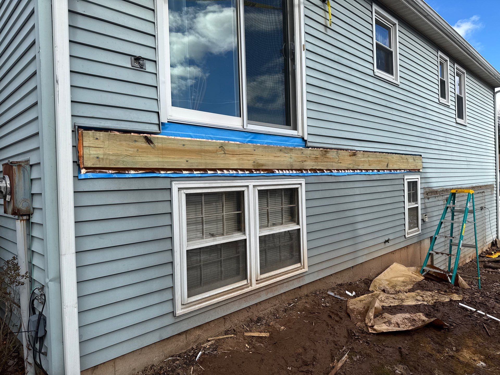 Deck replacement with Trex Select Saddle and White Select T rail. by DiGiorgi Roofing and Siding Inc