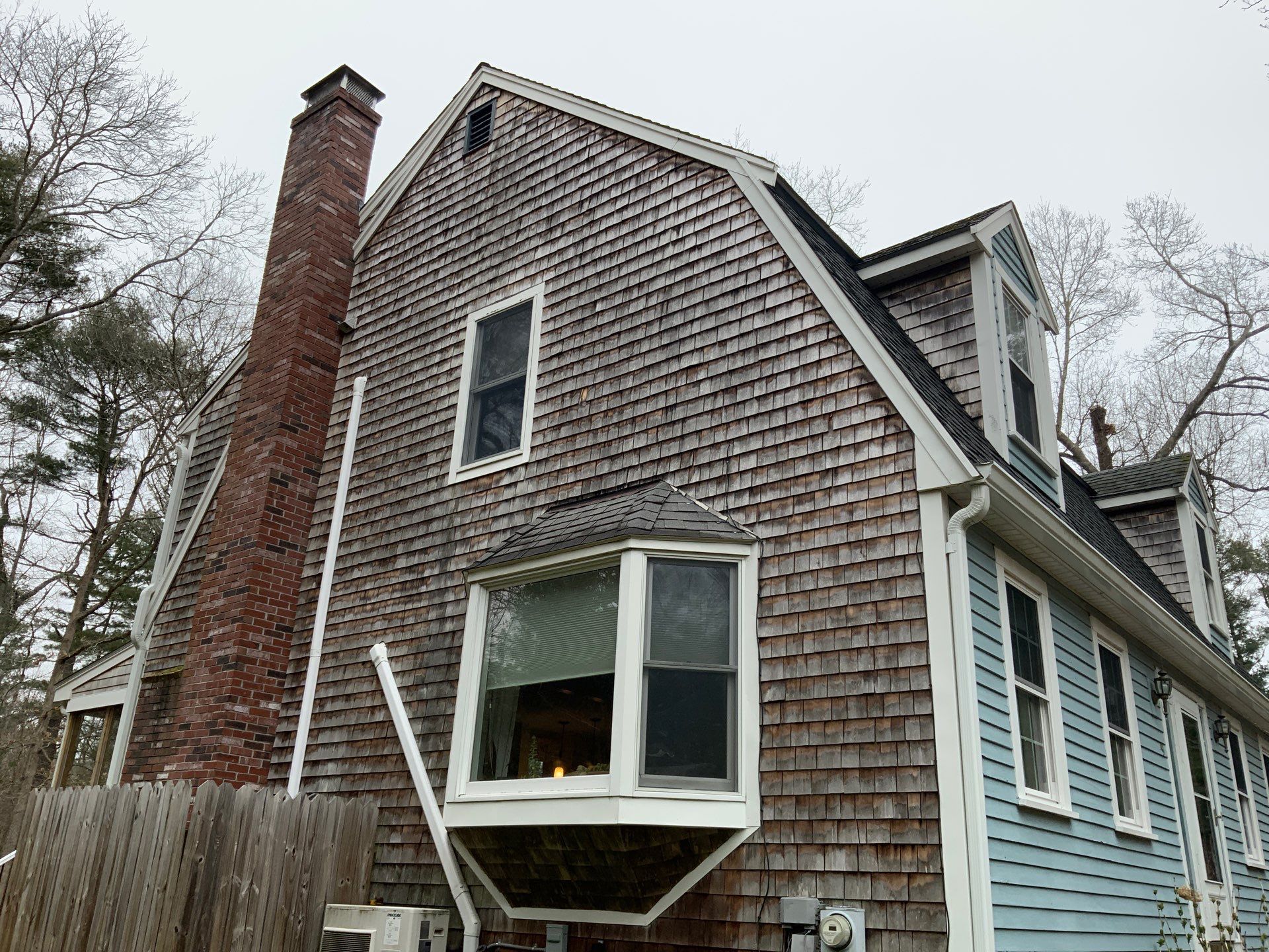 Partial residing project with Red Cedar shingles in Duxbury, MA by UBrothers Construction