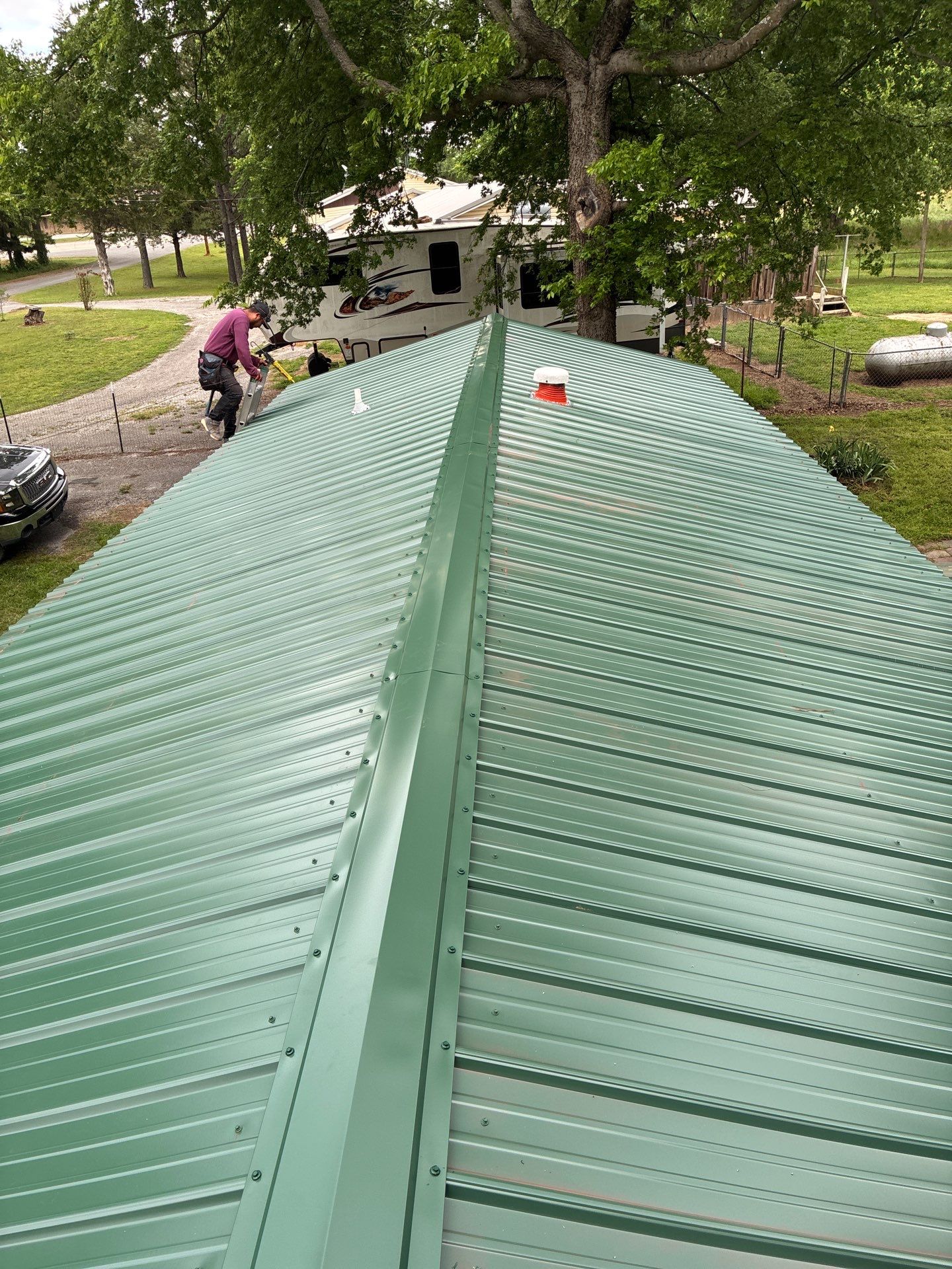 Metal roof installation by In & Out Construction & Remodeling, LLC