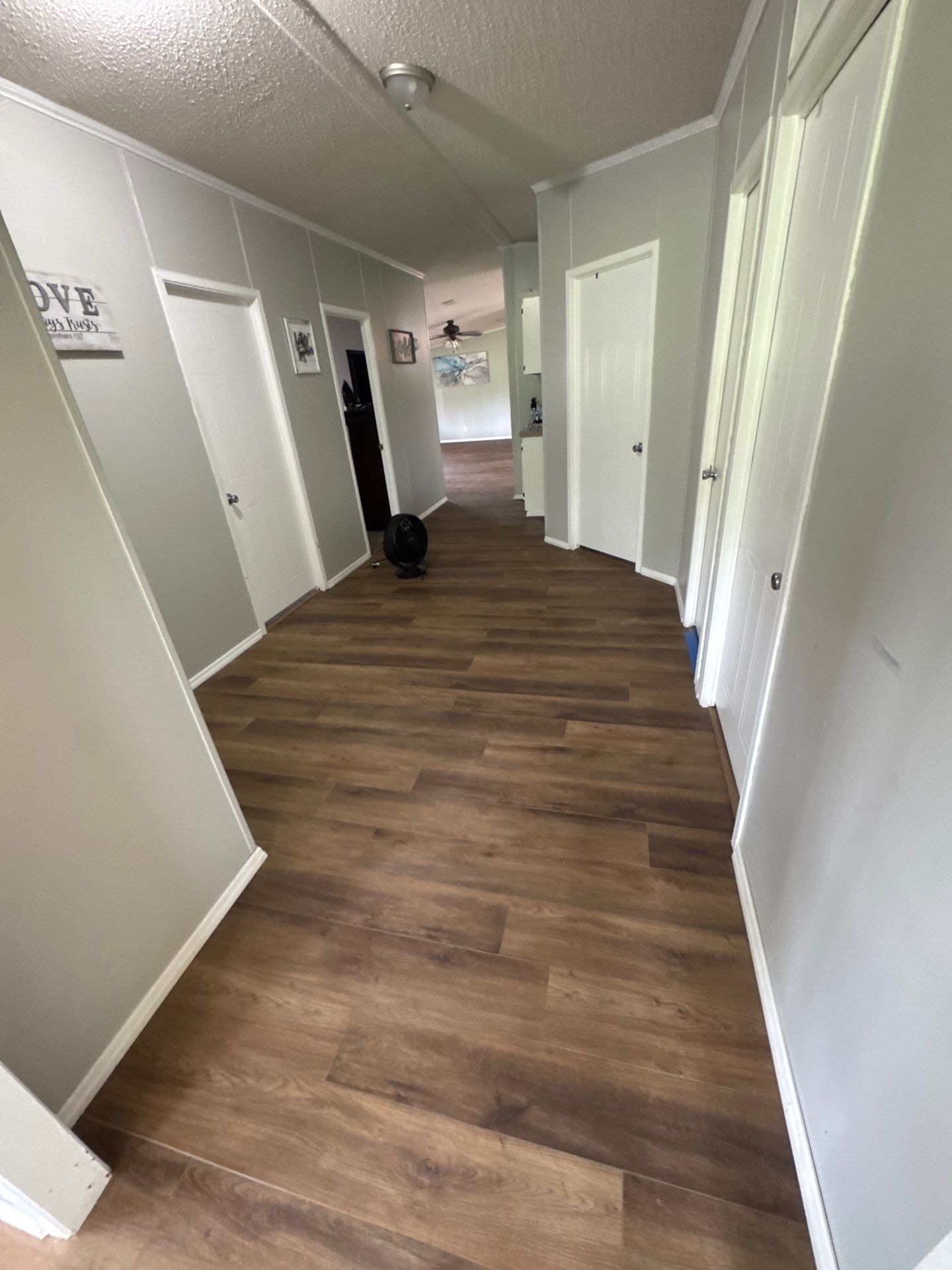 Subfloor Repairs With LVP Installation by Axtra Hand