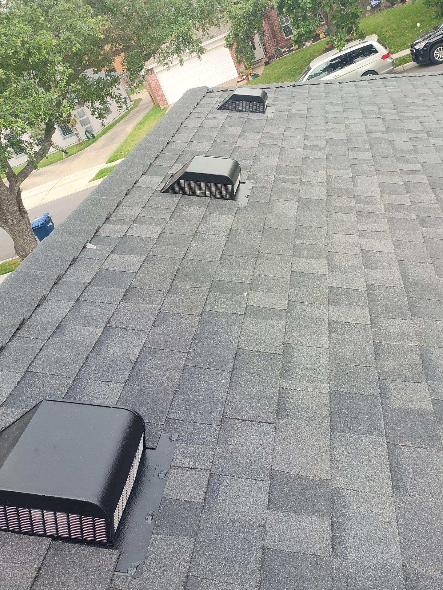 Nothing looks nicer than a little black roof by Bayfront Roofing and Construction