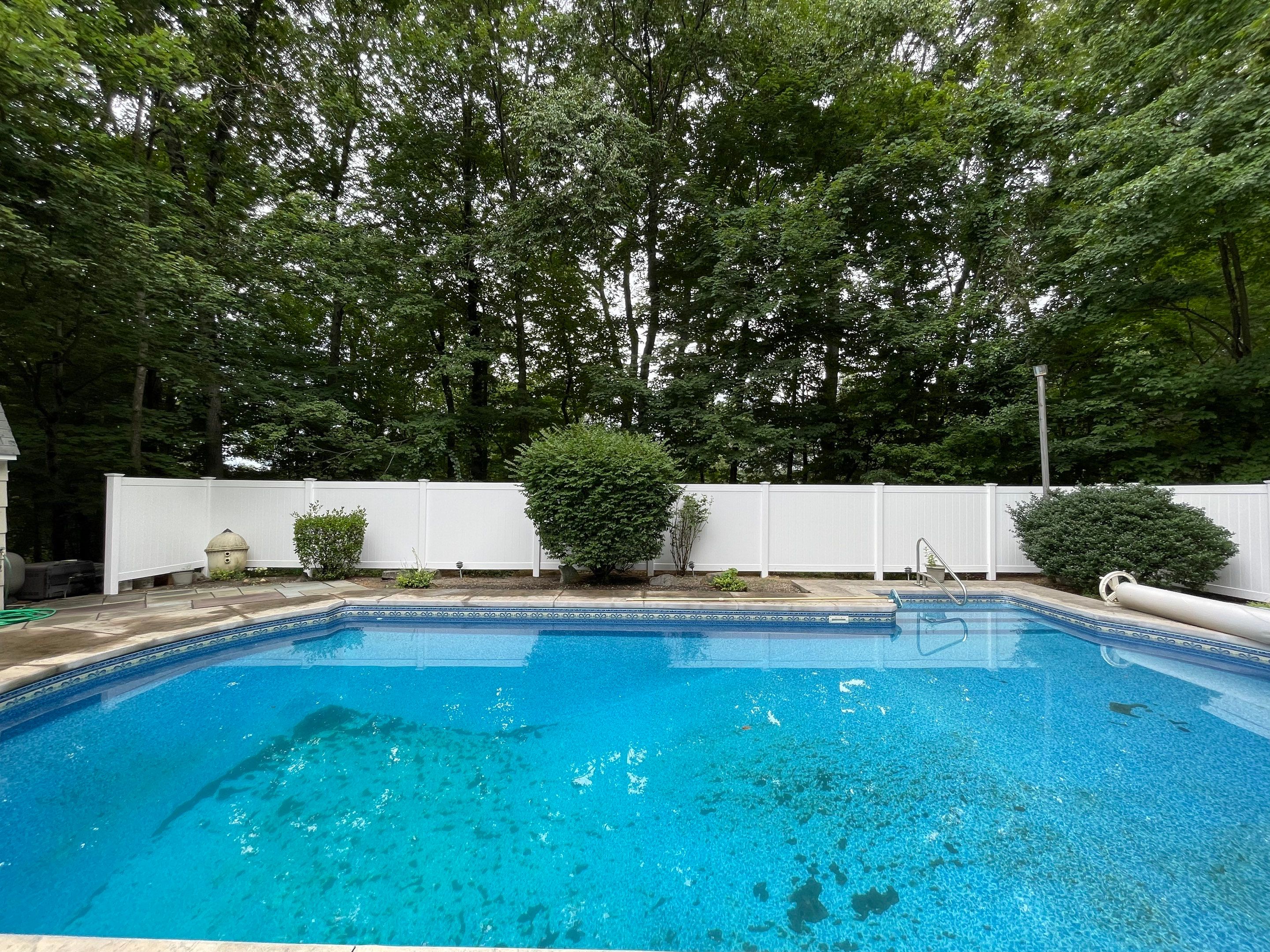 Pool Fence, Vinyl privacy fence and Vinyl picket style fence.  by DiGiorgi Roofing and Siding Inc