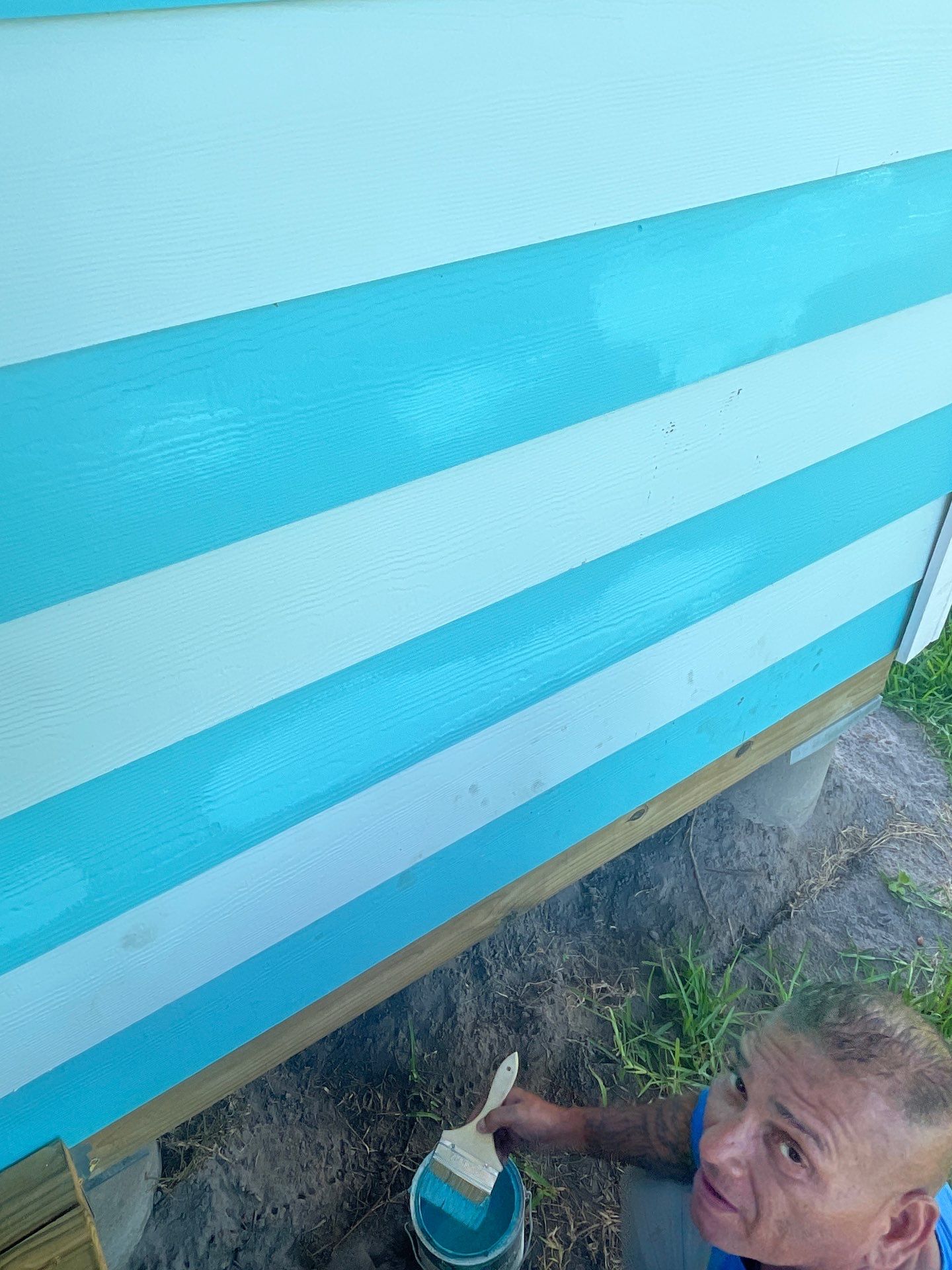 Stripped Beach Bungalow  by Bayfront Roofing and Construction