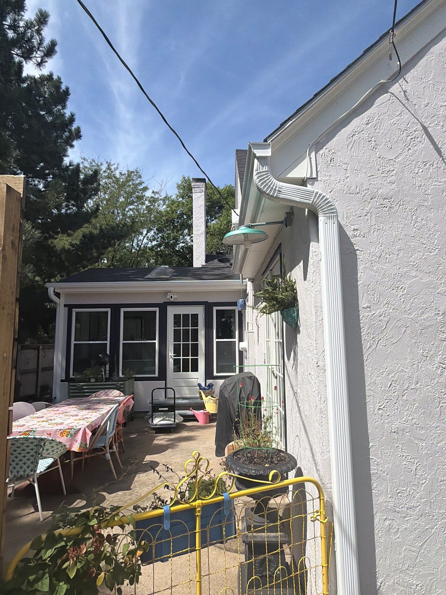 Exterior Stucco Painting and Trim Refresh in Sioux Falls by Select Painting, Coatings & Garage Cabinets