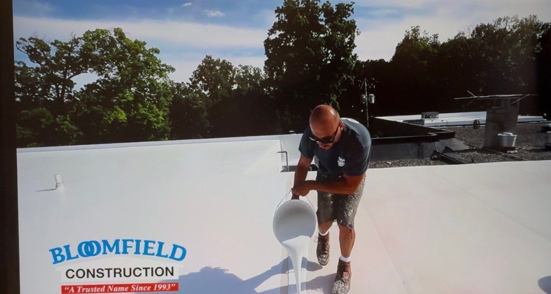 Roof Restoration/Coating at Edgewood Country Club by Bloomfield Construction & Restoration