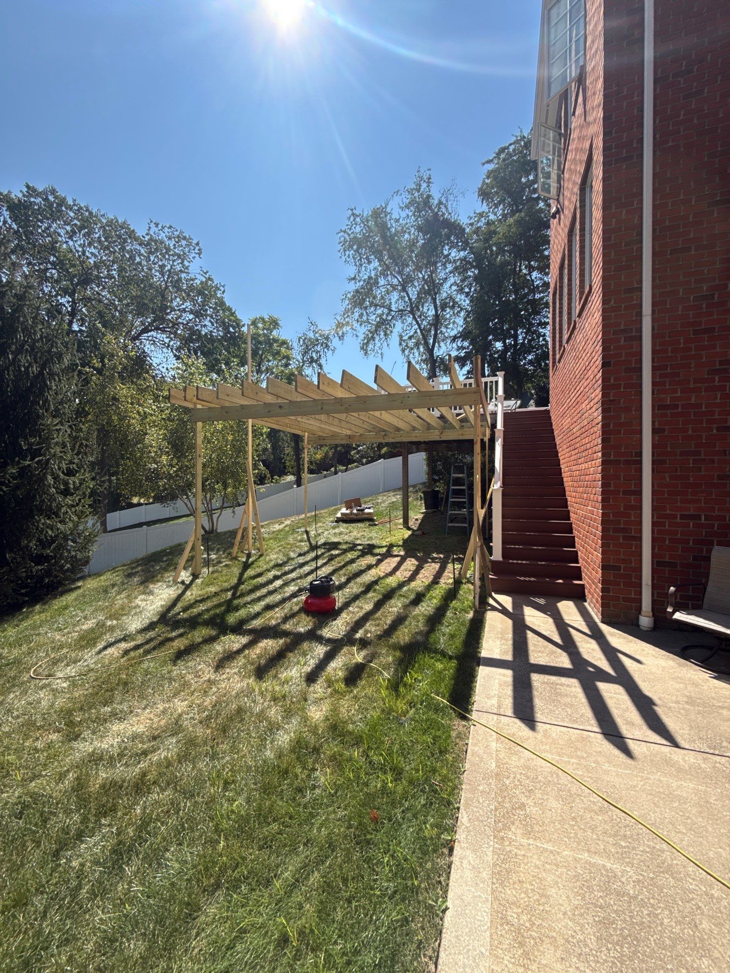 Deck extension  by Cousins Roofing Siding & Decks