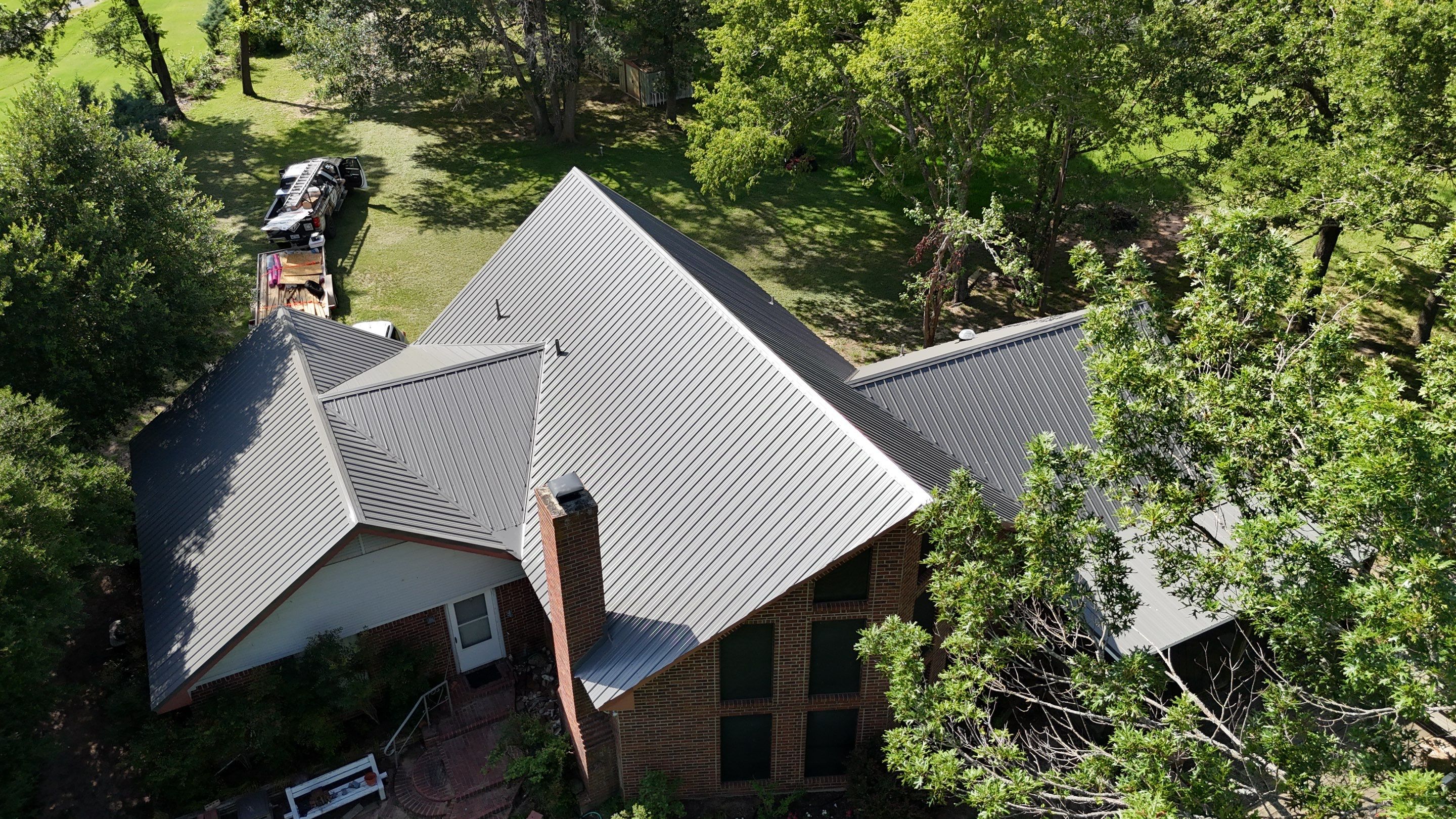 Charcoal Metal Roof at Lake Limestone, Tx by DT Roofing - Seth Wells