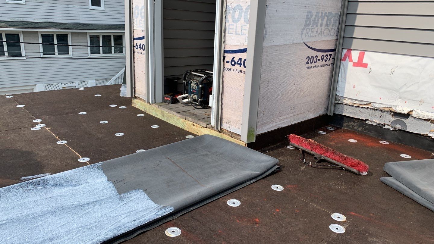 Deck Installation using trex over epdm roof by A Plus Exterior