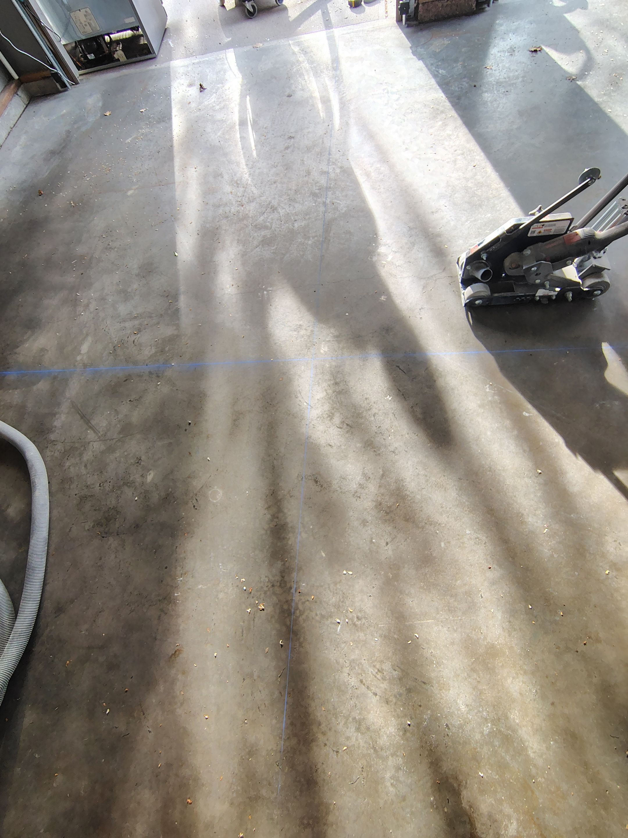 Garage Floor Concrete Coating and Crack Repair in Sioux Falls by Select Painting, Coatings & Garage Cabinets