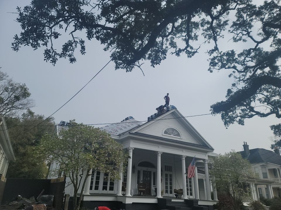 Residential Roofing Installation using Roof Replacement by American Roofing & Construction LLC
