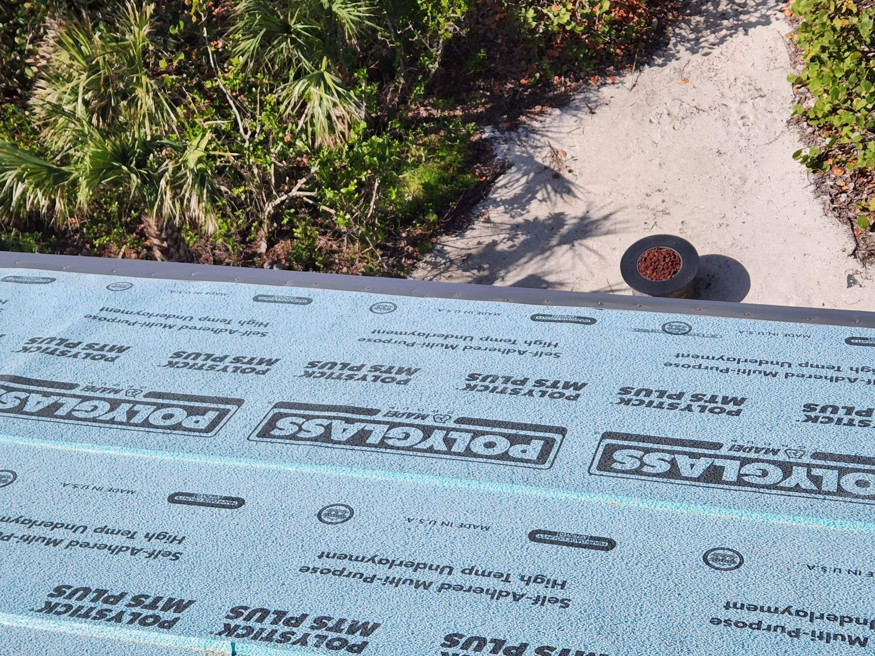 Residential Roofing Installation using Gulf Coast Metals Gulf Seam Panels by Four Peaks Roofing